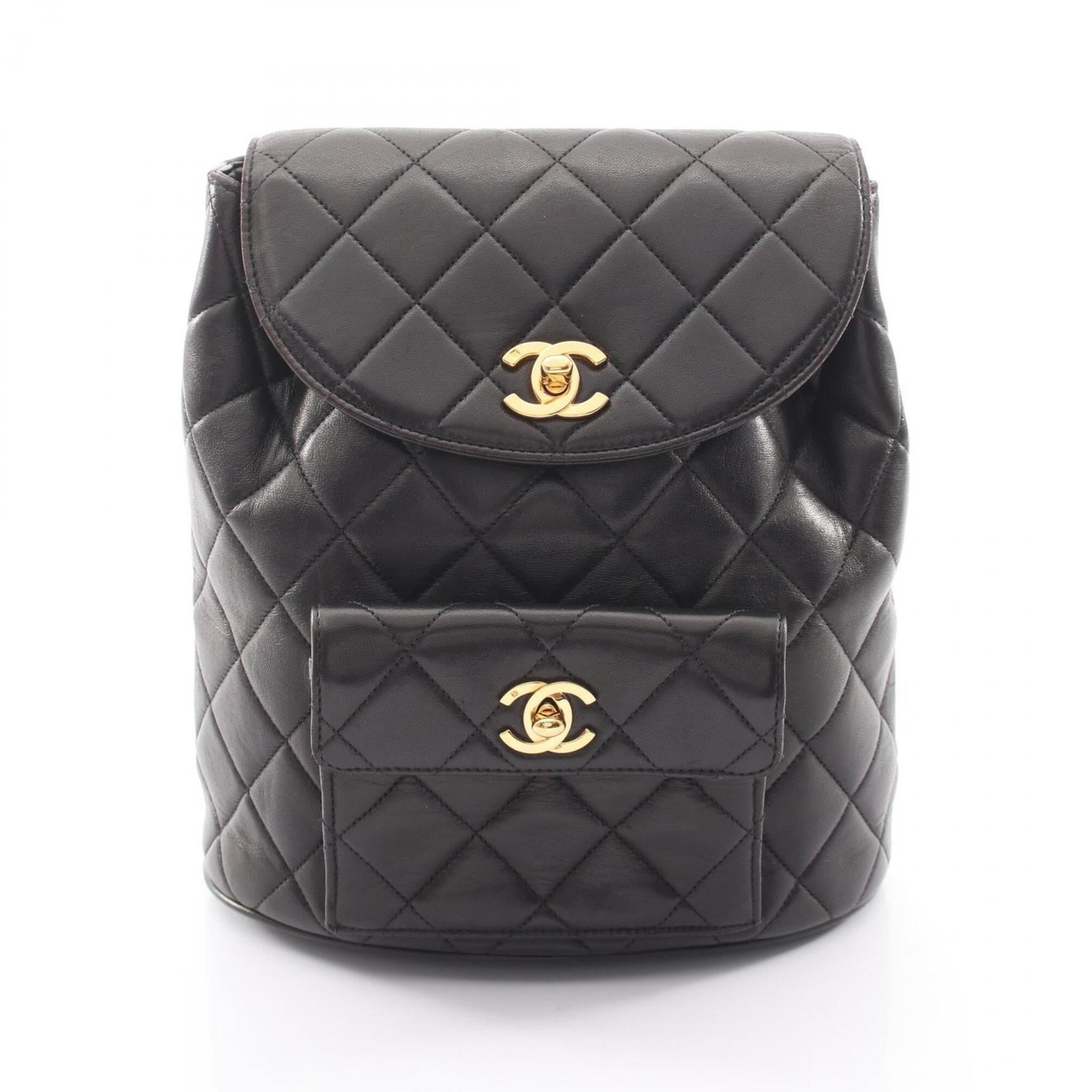 Leather Backpack by Chanel: Leather Backpack by Chanel Leather Backpack by Chanel features high-quality lambskin material, precise dimensions, and a classic black color. Made from genuine leather, this stylish backpack boasts a 