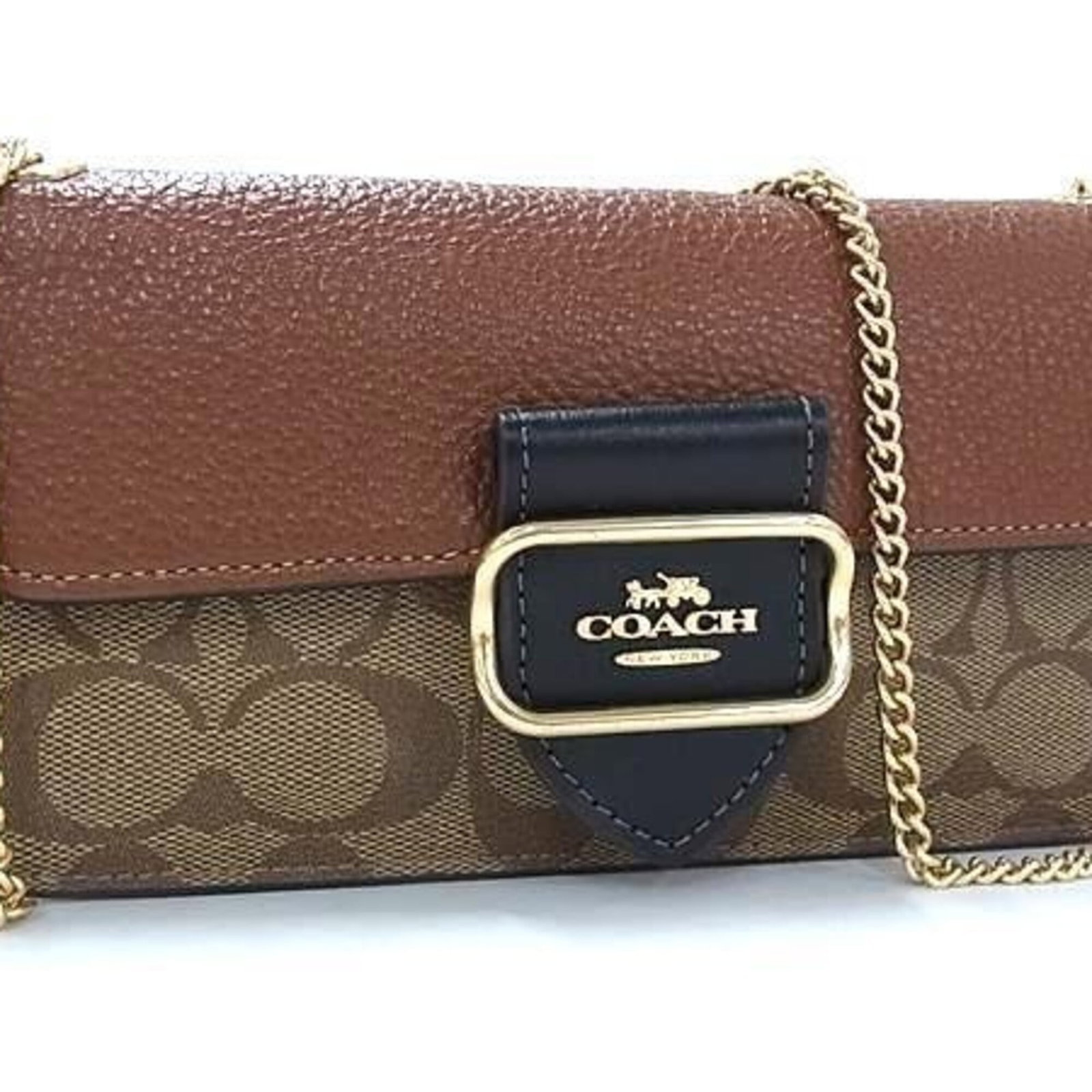 Coach Shoulder Bag Pvc Leather: Coach Shoulder Bag Pvc Leather The Coach Country shoulder bag features a unique combination of PVC and leather materials, with a distinctive brown color. This stylish bag measures 11cm x 20cm x 1cm an