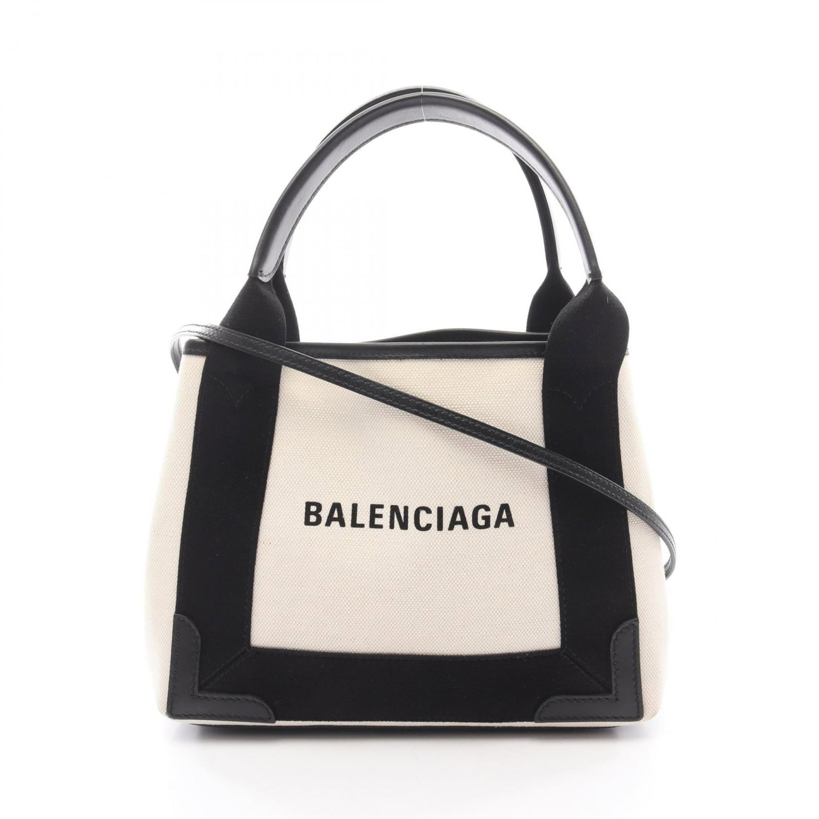 Balenciaga Handbag Canvas Leather: Balenciaga Handbag Canvas Leather Canvas and leather combine in this sleek Balenciaga handbag, featuring a black canvas exterior with an ivory leather trim. The bag measures 20cm x 25cm x 7cm and incl