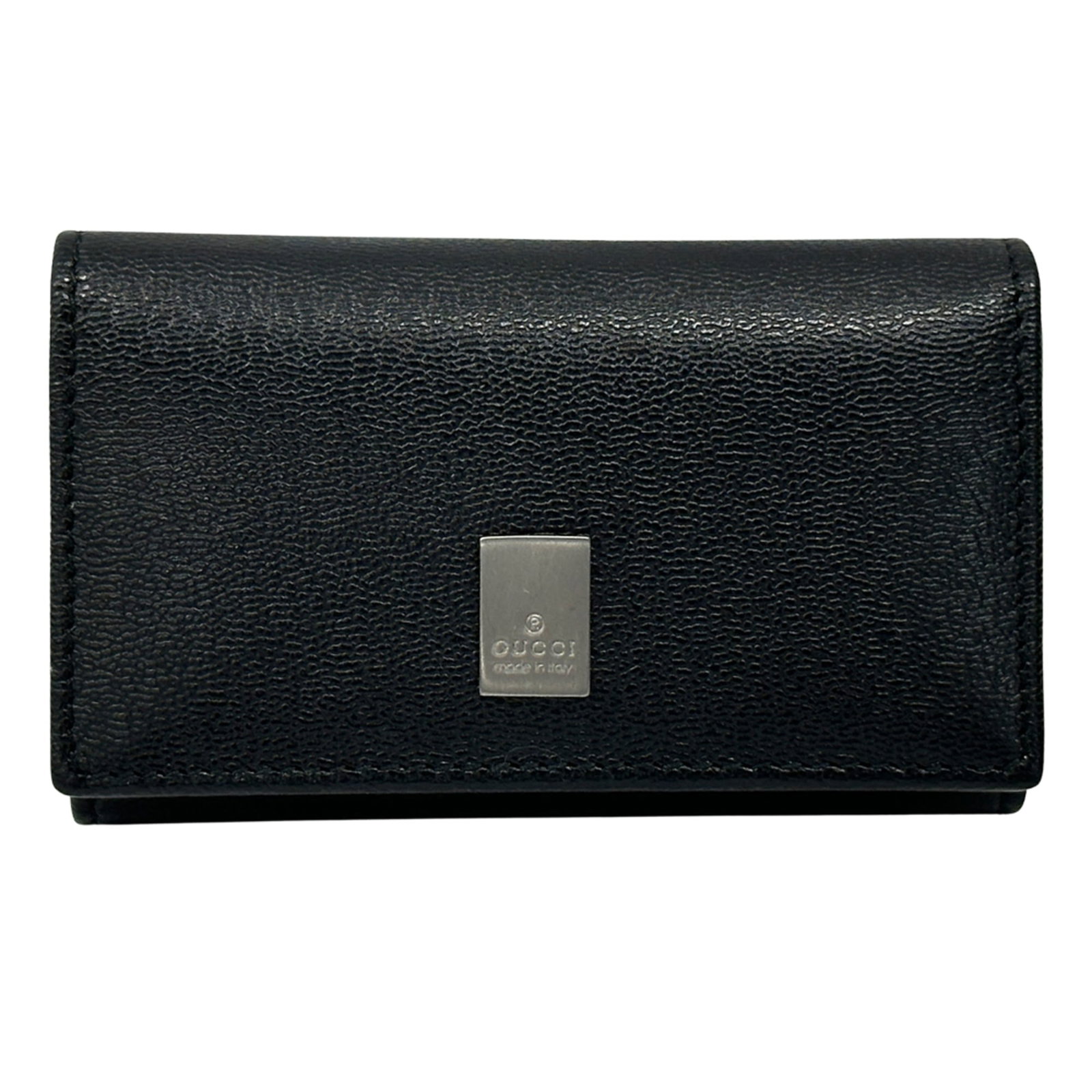 Keycase Leather Gucci: Keycase Leather Gucci Black leather keycase from Gucci, measuring 6cm x 10cm x 3cm. Made from high-quality leather, this compact accessory features a sleek design that complements any outfit. The sign