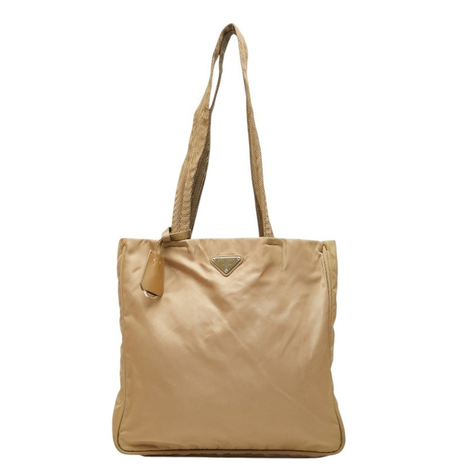 Nylon tote bag by Prada: Nylon tote bag by Prada Prada's nylon tote bag boasts clean lines and a classic design, featuring a sturdy 31cm x 31cm x 6.5cm size that fits comfortably in the hand. Made from high-quality nylon mate
