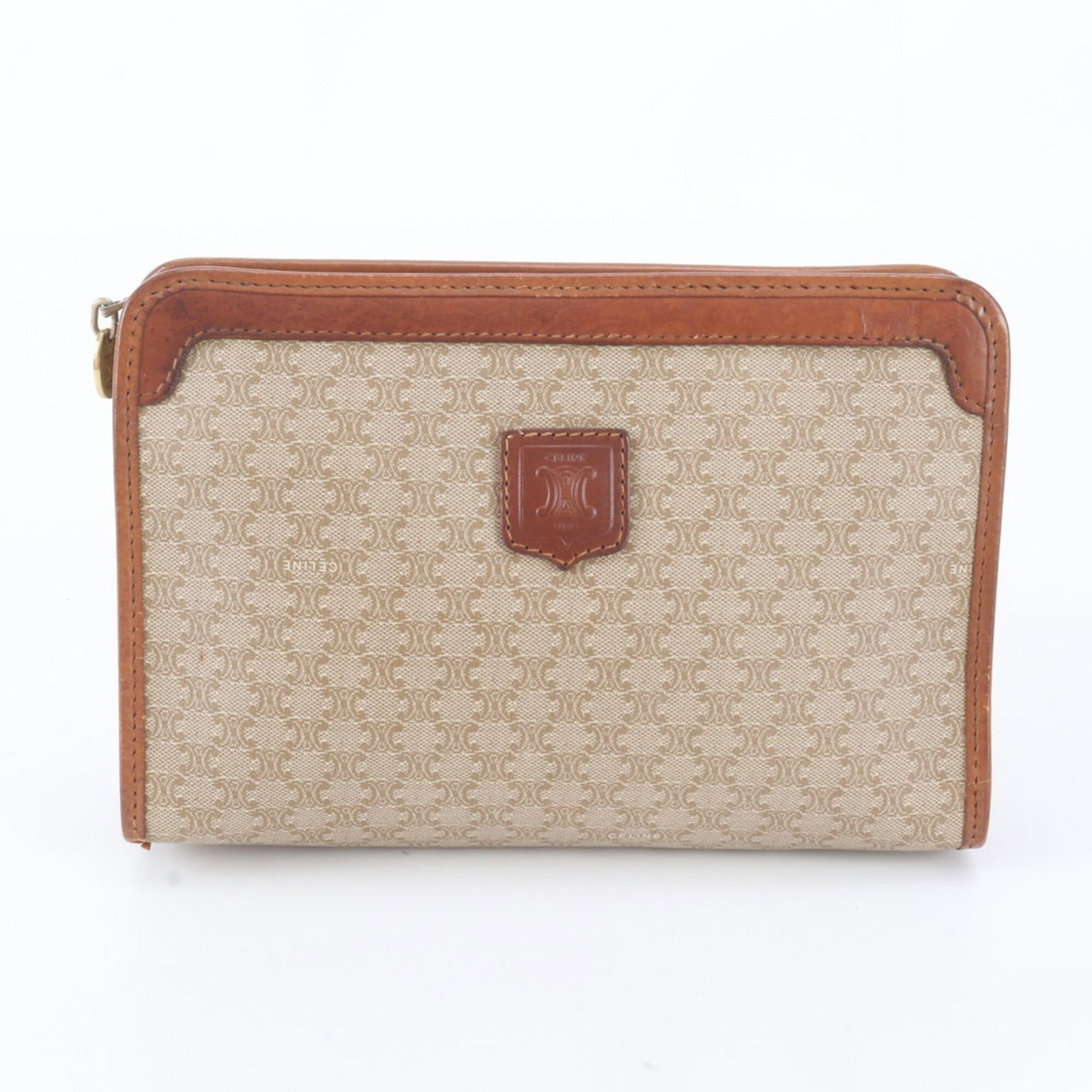Celine Leather Handbag Canvas Coated: Celine Leather Handbag Canvas Coated The Celine Leather Handbag Canvas Coated boasts a sturdy brown leather exterior with a canvas coating, providing a unique blend of style and durability. Measuring 