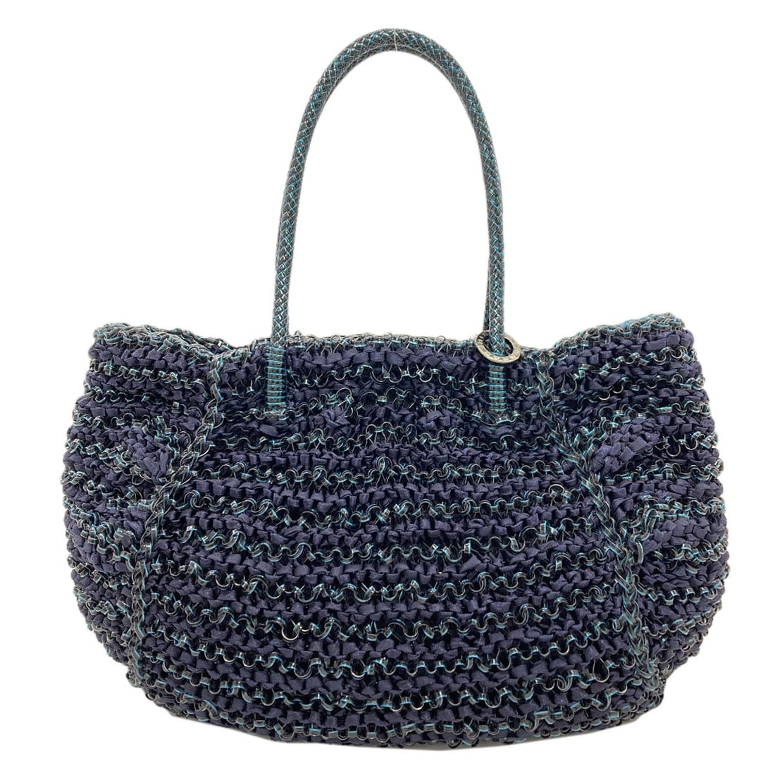 Wire bag handbag pvc anteprima: Wire bag handbag pvc anteprima Blue PVC Wire Bag Handbag. Made from PVC, this blue wire bag handbag features an exterior color matching its interior. The ANTEPRIMA brand is associated with this style.