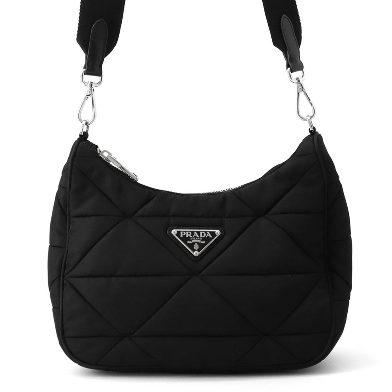 Shoulder Bag Nylon Canvas Handbag Prada: Shoulder Bag Nylon Canvas Handbag Prada Nylon and canvas materials blend together in this sleek black shoulder bag from Prada, measuring 19.5cm x 23.5cm x 7cm. The Italian design combines functionalit
