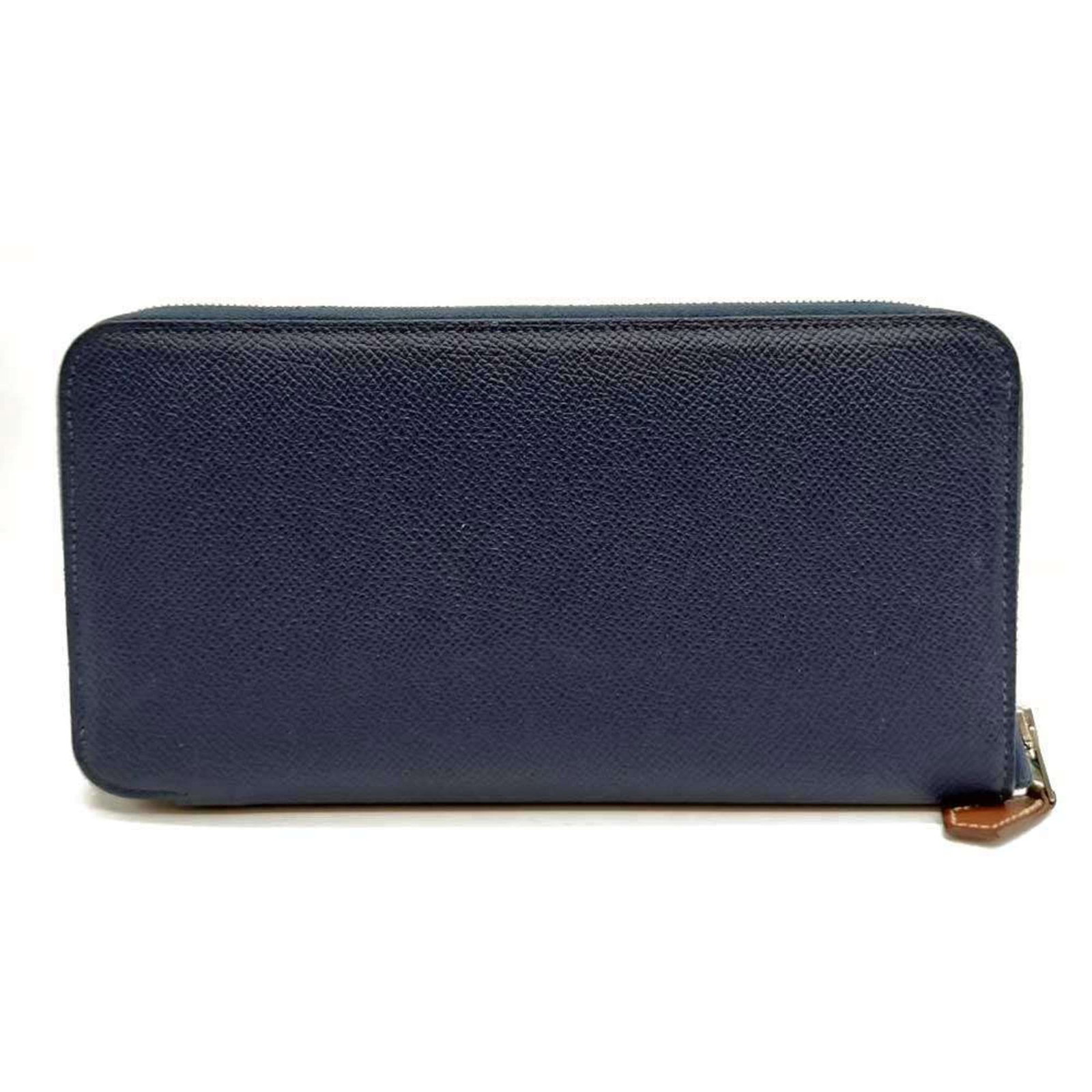 Hermes Long Epsom Leather Bi Fold Wallet: Hermes Long Epsom Leather Bi Fold Wallet Navy Epsom leather bi-fold wallet with zipper closure, measuring 10.5cm x 20cm x 1.5cm and weighing 165g, features high-quality construction from the renowned 