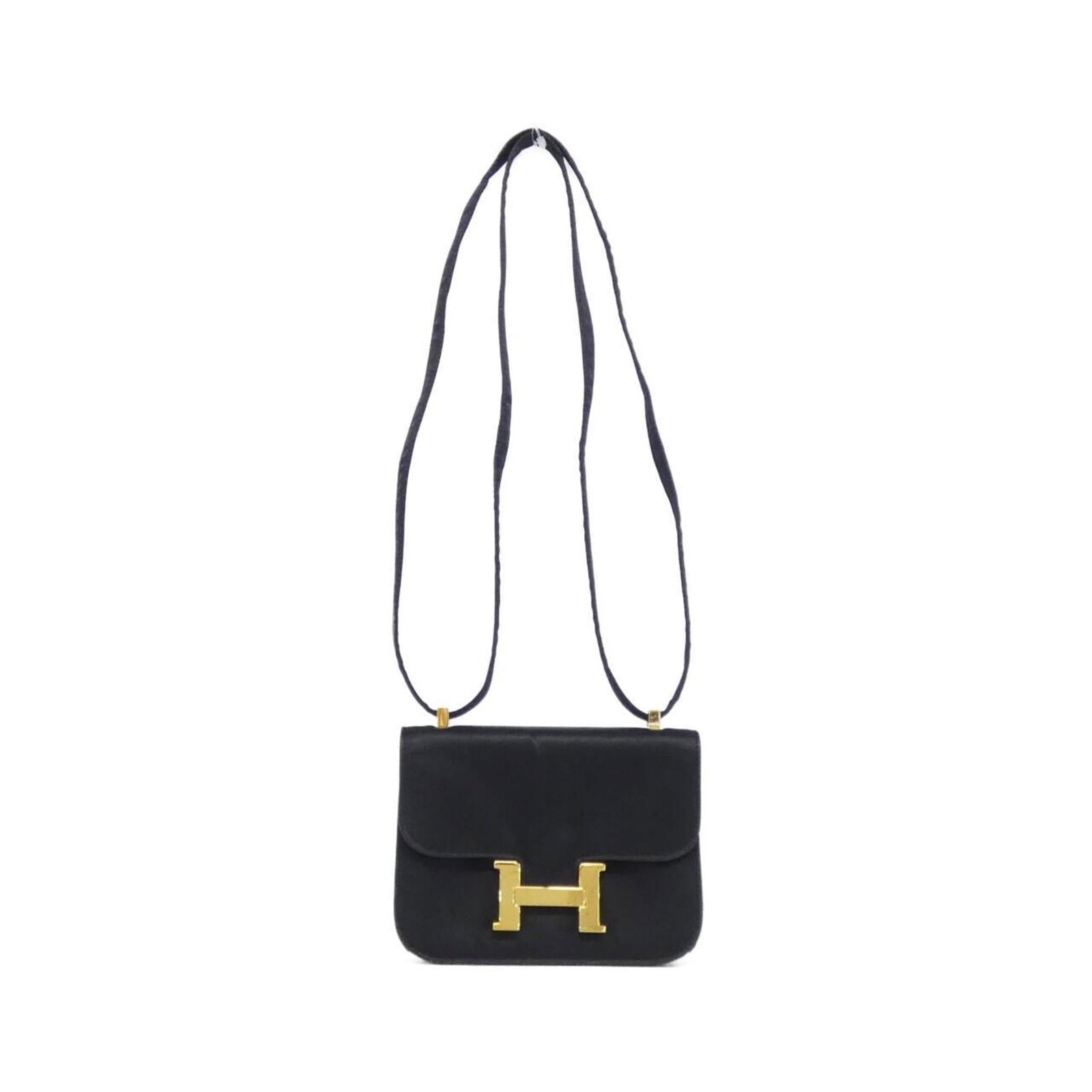 Satin shoulder bag by Hermes: Satin shoulder bag by Hermes Satin shoulder bag by Hermes features sleek black satin material, gold hardware accents, and adjustable straps for a customizable fit. Weighing in at 140g, this compact ba