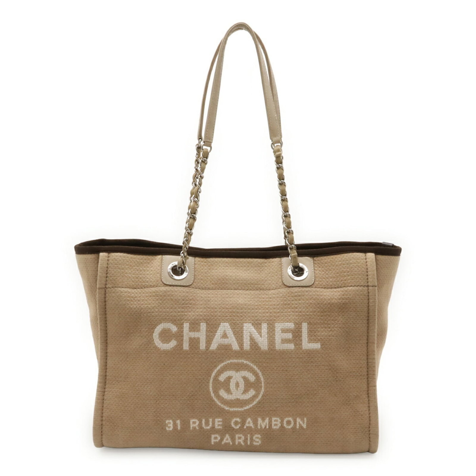 Canvas leather tote bag shoulder bag by Chanel: Canvas leather tote bag shoulder bag by Chanel Canvas leather tote bag by Chanel, featuring a classic design with a beige and brown color combination. The bag measures 26cm x 34cm x 13cm and comes wit