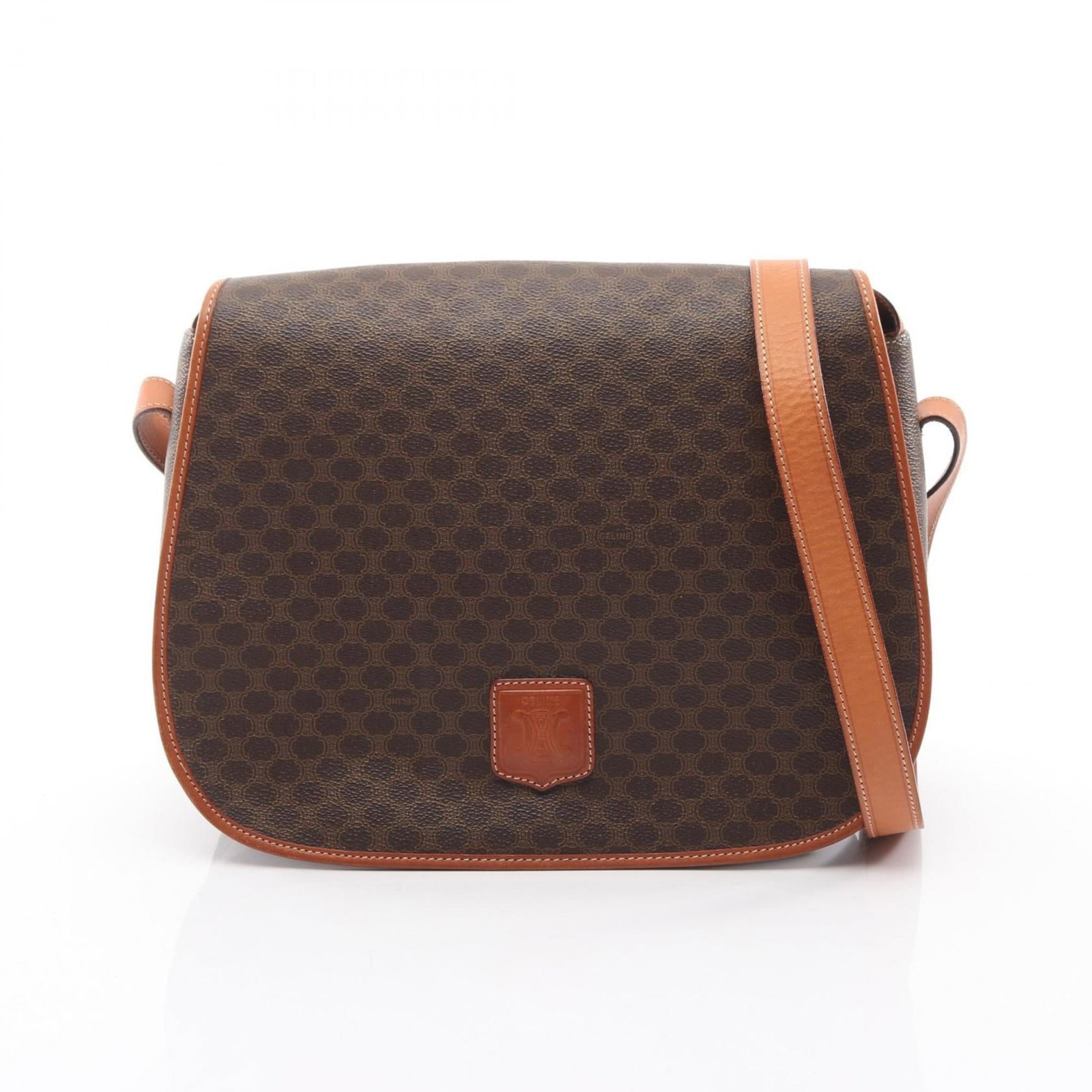 Canvas coated leather shoulder bag: Canvas coated leather shoulder bag Coated canvas and leather come together in this sleek shoulder bag, measuring 25cm x 31cm x 10cm. The brown color adds a touch of sophistication to its classic desig