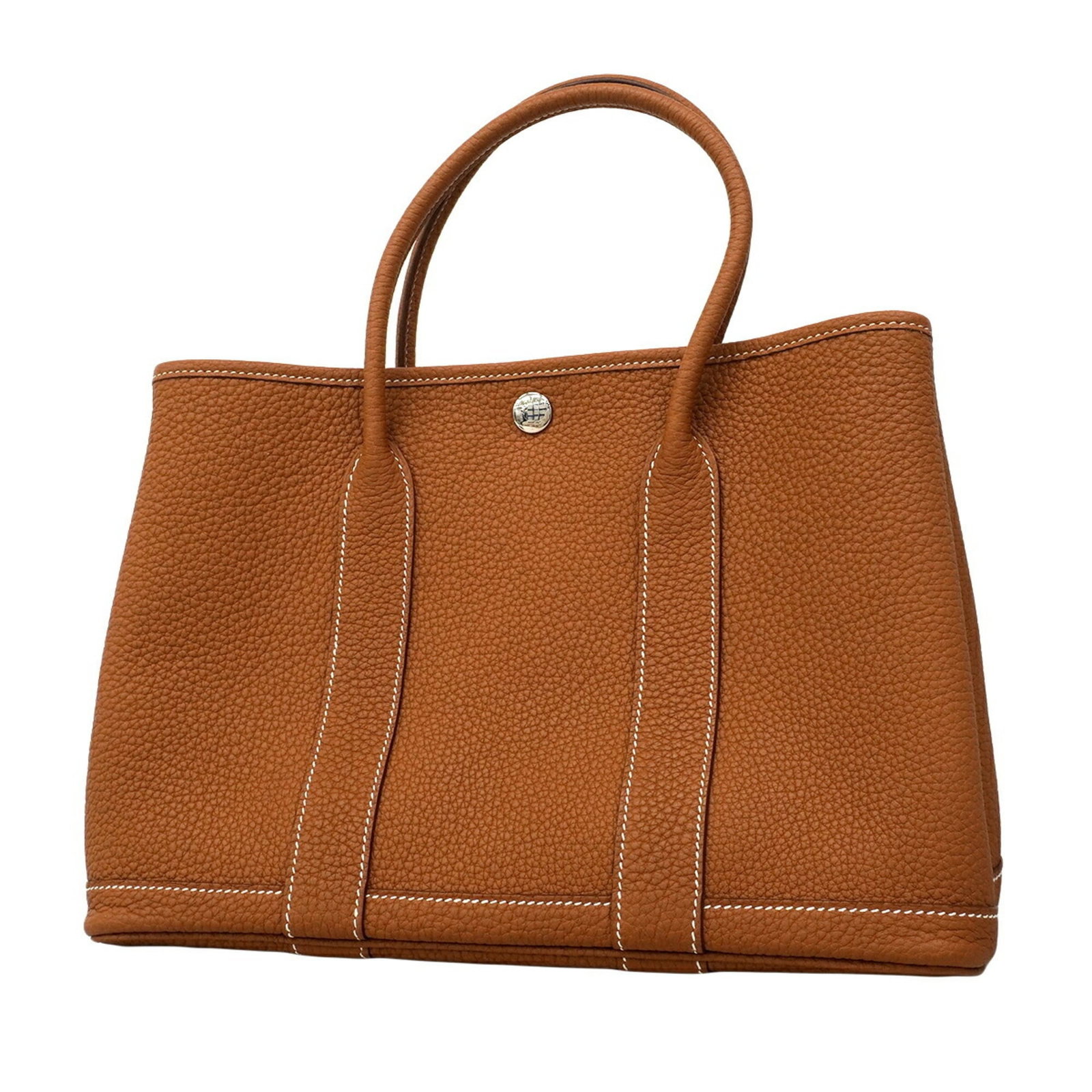 Negonda leather tote bag by Hermes: Negonda leather tote bag by Hermes Negonda leather tote bag by Hermes boasts sleek, sophisticated design with gold hardware and silver accents. Made from high-quality Negonda leather, this tote measur