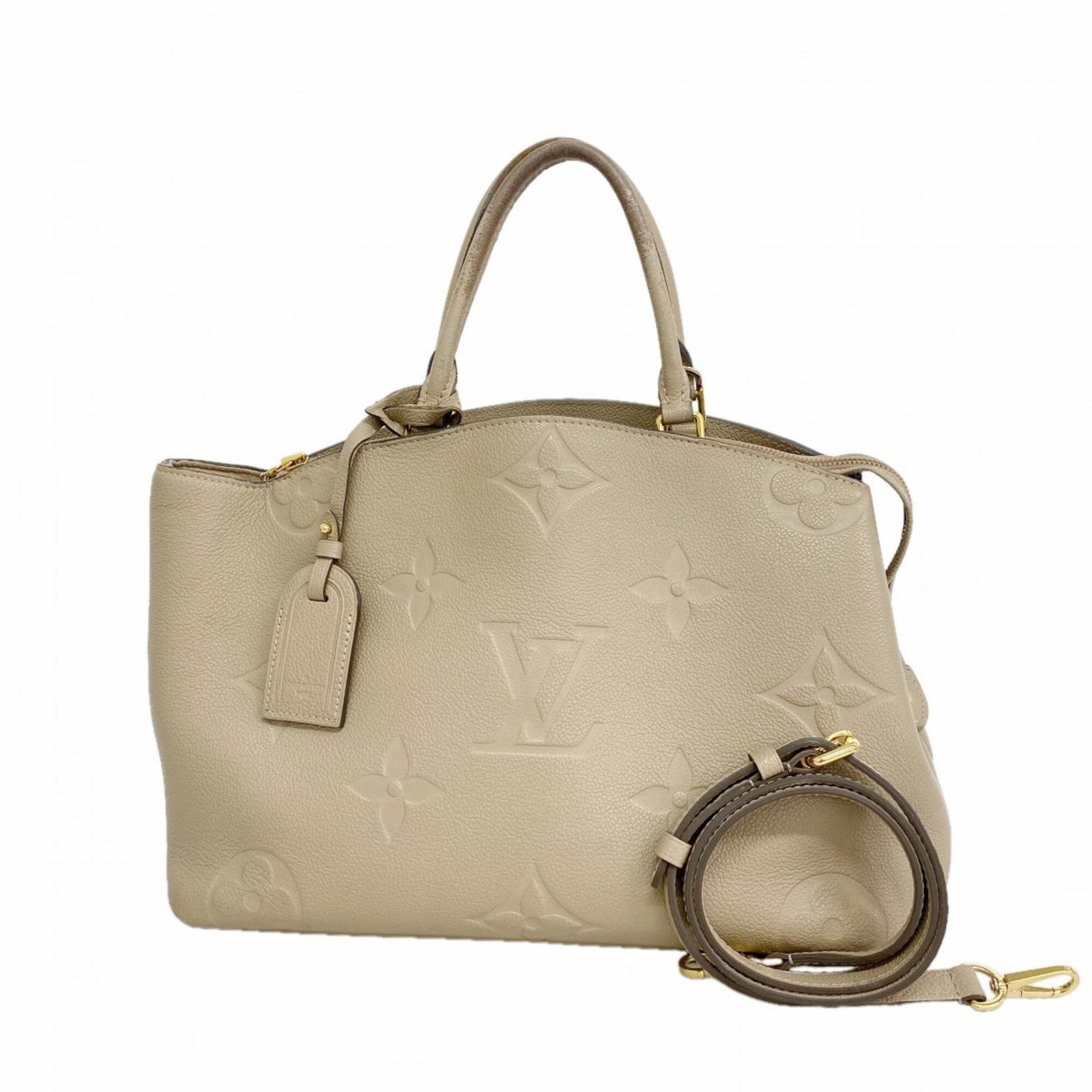 Louis Vuitton Handbag: Louis Vuitton Handbag Louis Vuitton's iconic Tourterelle handbag boasts its signature monogram pattern and striking color. Measuring 25cm x 33.5cm x 16cm, this stylish accessory features a classic des