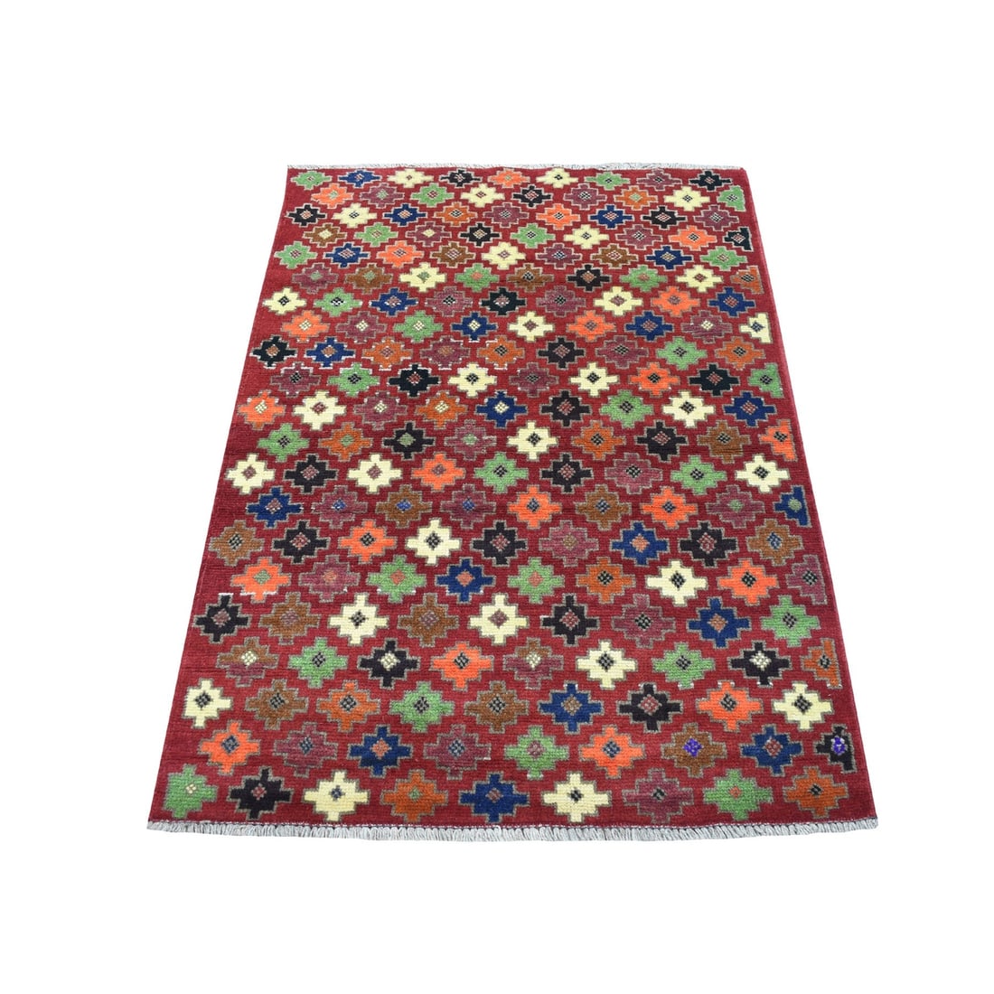3'1"x4'10" All Over Design Knotted Pure Wool Colorful Afghan Village Rug: 3'1"x4'10" All Over Design Knotted Pure Wool Colorful Afghan Village Rug This vibrant, all-over design knotted pure wool Afghan village rug boasts a striking red color and intricate patterns reminisce