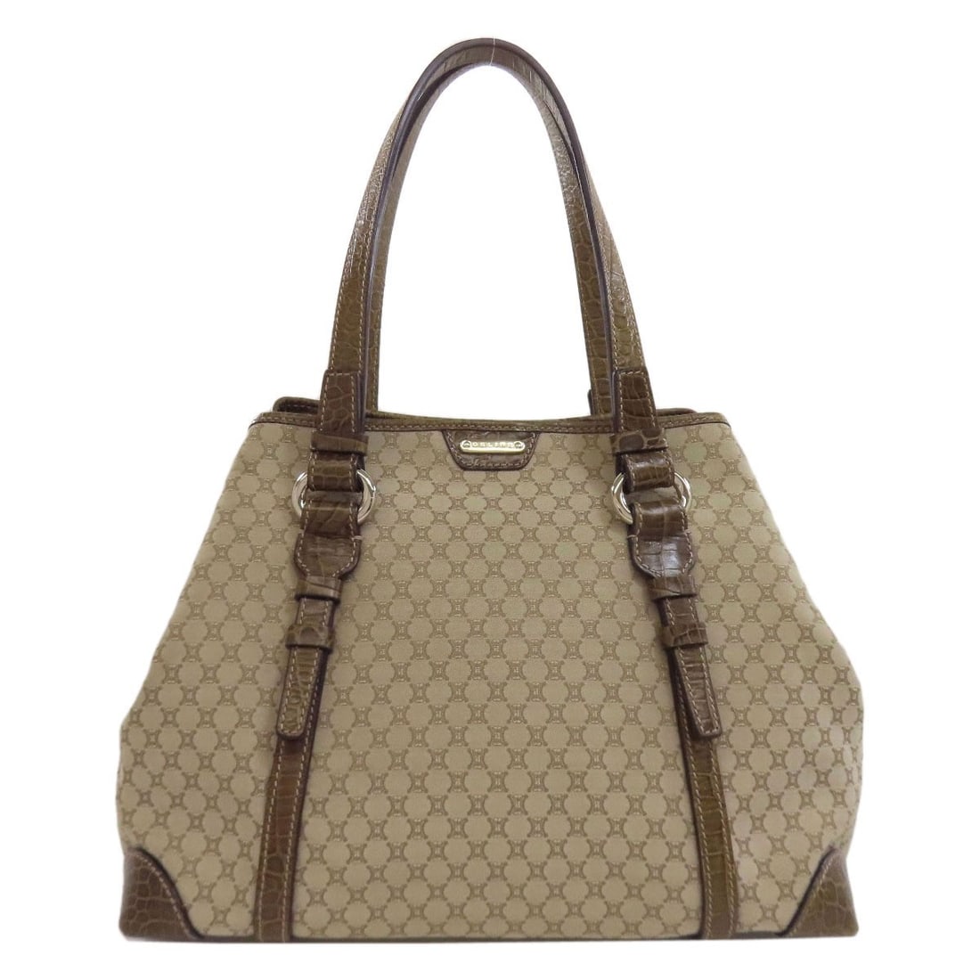 Celine Macadam Pattern Tote Bag Canvas: Celine Macadam Pattern Tote Bag Canvas Brown canvas tote bag with Celine Macadam pattern. This stylish tote features a classic design and a durable canvas exterior. The brown color provides a versatil