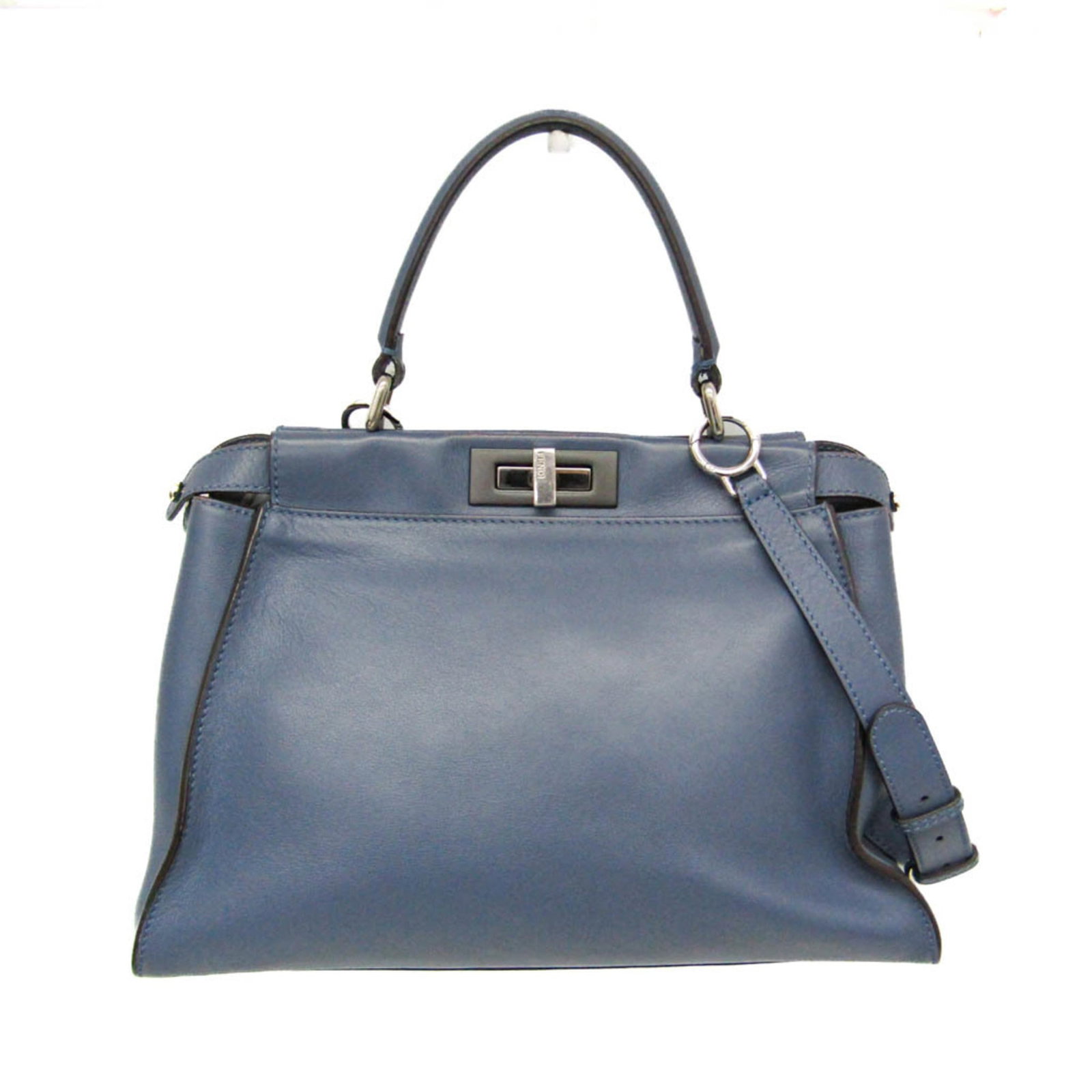 Fendi Handbag Shoulder Bag Leather: Fendi Handbag Shoulder Bag Leather The Fendi Peekaboo shoulder bag features a sleek blue leather design with a turn lock closure and an inner zipper pocket for added convenience. Measuring 24cm x 34cm