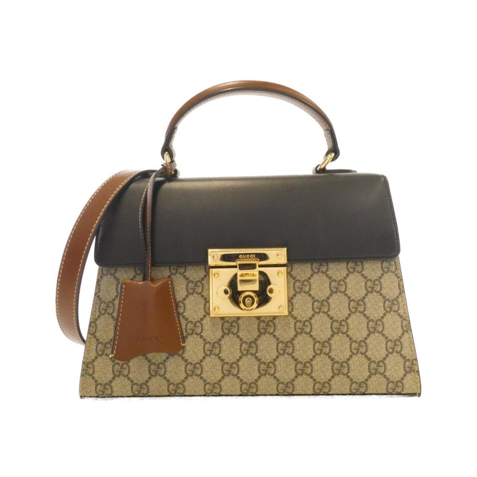 Gucci Canvas Gg Supreme Handbag: Gucci Canvas Gg Supreme Handbag Gucci Canvas Gg Supreme Handbag in Beige and Brown, measuring 19cm x 28cm x 11cm. This GG Supreme handbag features a unique canvas material and boasts the iconic Gucci 
