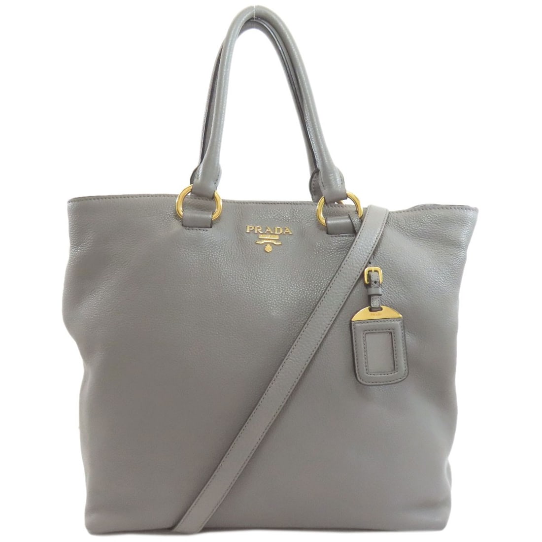 2Way Tote Bag Calf Prada: 2Way Tote Bag Calf Prada Calf leather construction gives this PRADA-style tote bag its distinctive look and feel. The gray exterior material exudes understated elegance, while the classic design ensur