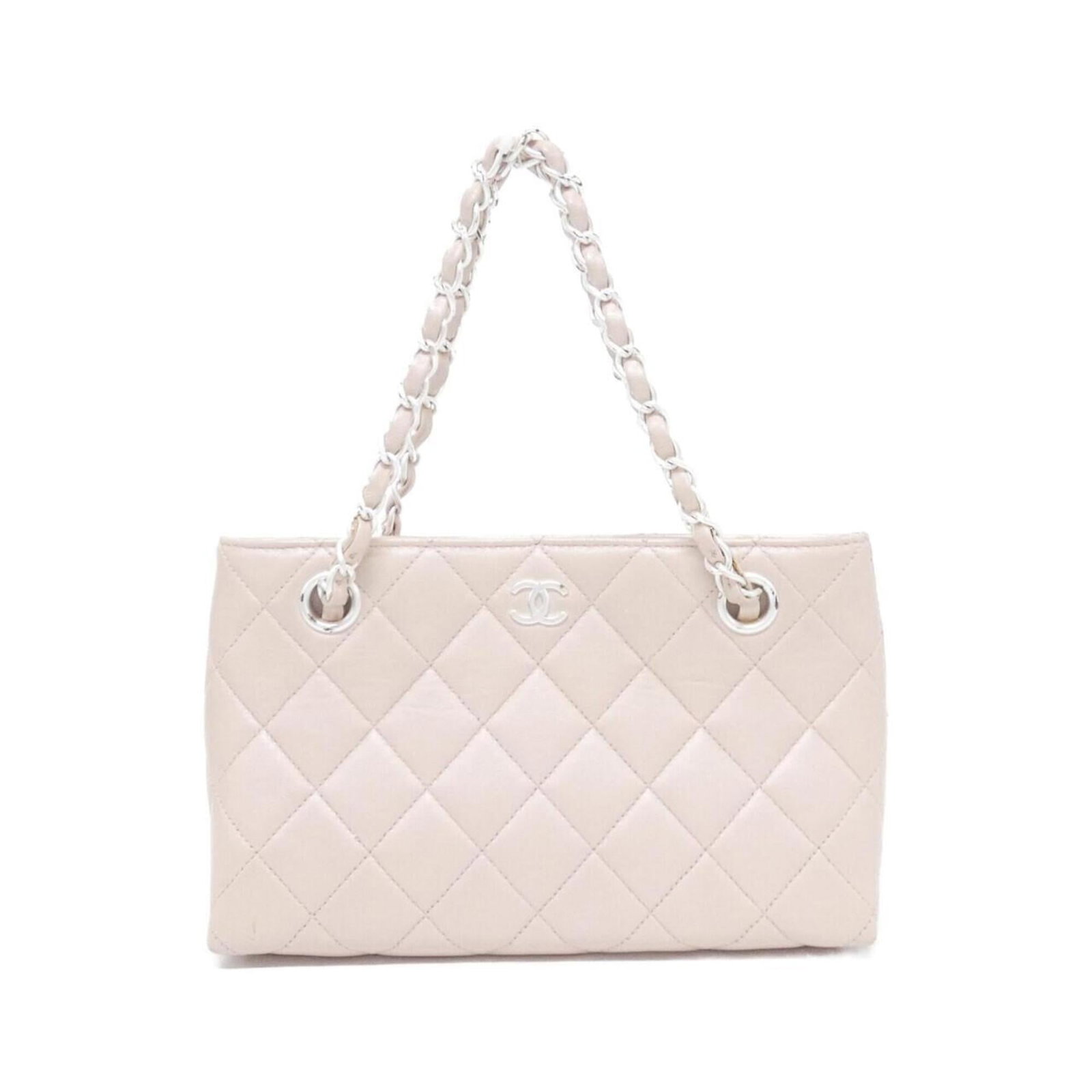 Chanel Handbag leather: Chanel Handbag leather Light pink lambskin Chanel handbag with dimensions 14cm x 23cm x 6.5cm, available for purchase. This luxurious leather handbag features a classic design and premium materials.