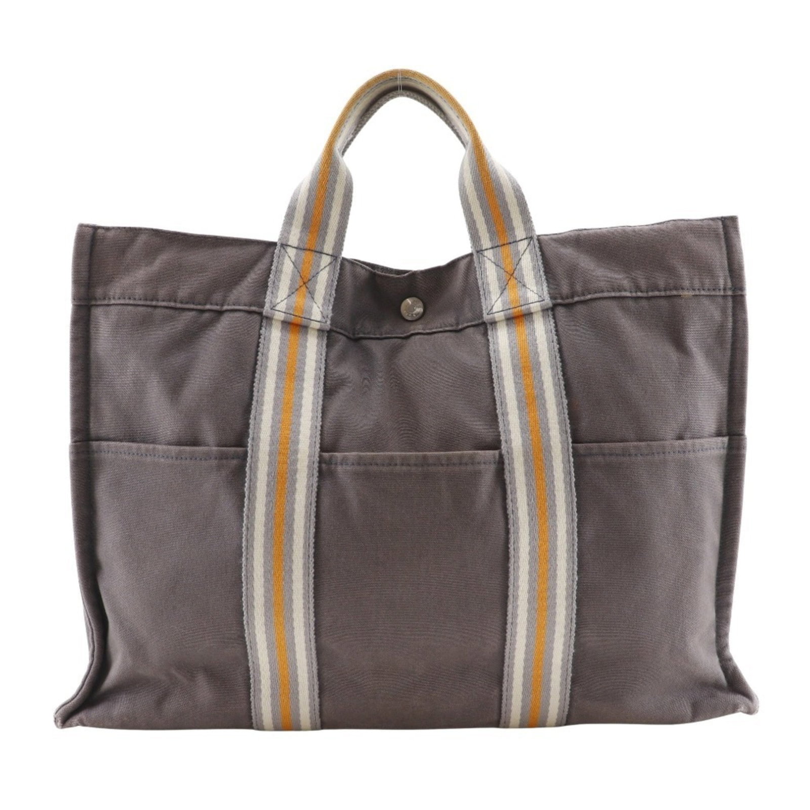Hermes Handbag Tote Bag Cotton Canvas: Hermes Handbag Tote Bag Cotton Canvas Cotton canvas tote bag from Hermes, featuring a classic gray color and a timeless design. Made from high-quality cotton canvas, this bag measures 30cm x 43cm x