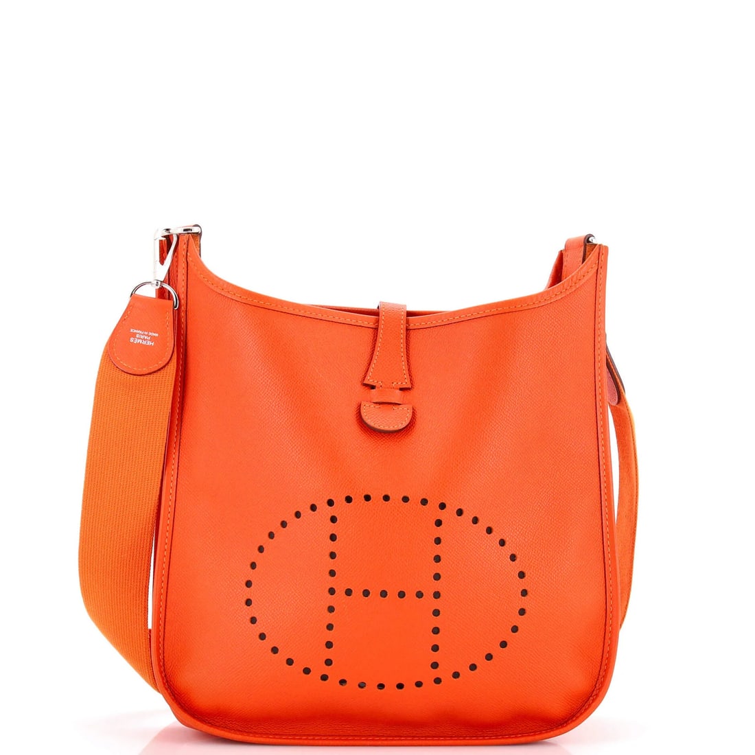Evelyne Gen I Hermes Epsom Bag PM: Evelyne Gen I Hermes Epsom Bag PM The Evelyne Gen I Hermes Epsom Bag PM boasts a vibrant orange exterior, perfectly balanced by the rich tones of its raw leather interior. Measuring just 10" in height
