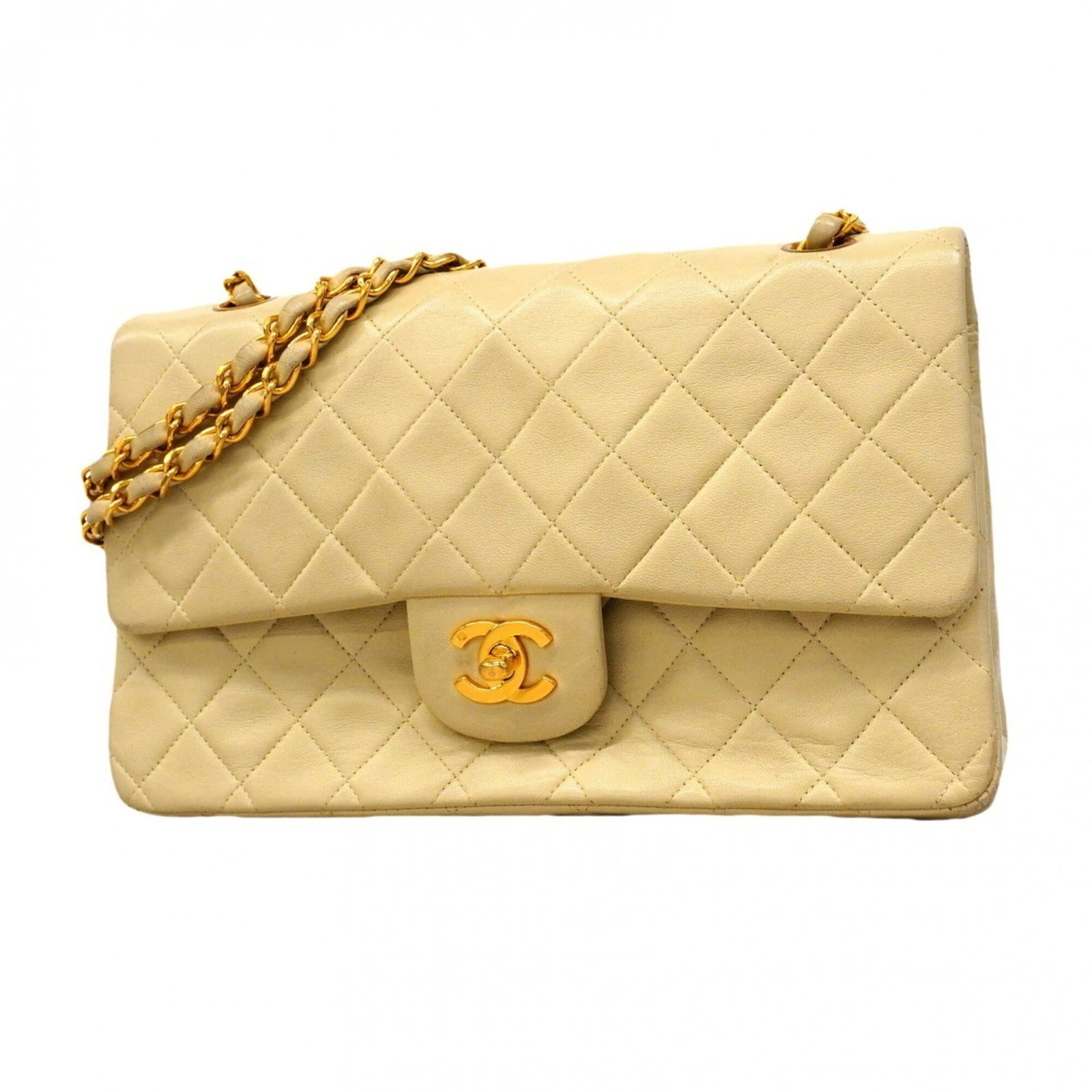 Shoulder Bag Leather Chanel: Shoulder Bag Leather Chanel This luxurious ivory lambskin shoulder bag from Chanel boasts elegant gold hardware, adding a touch of sophistication to its classic design. Measuring 17cm x 26cm x 6.5cm, 