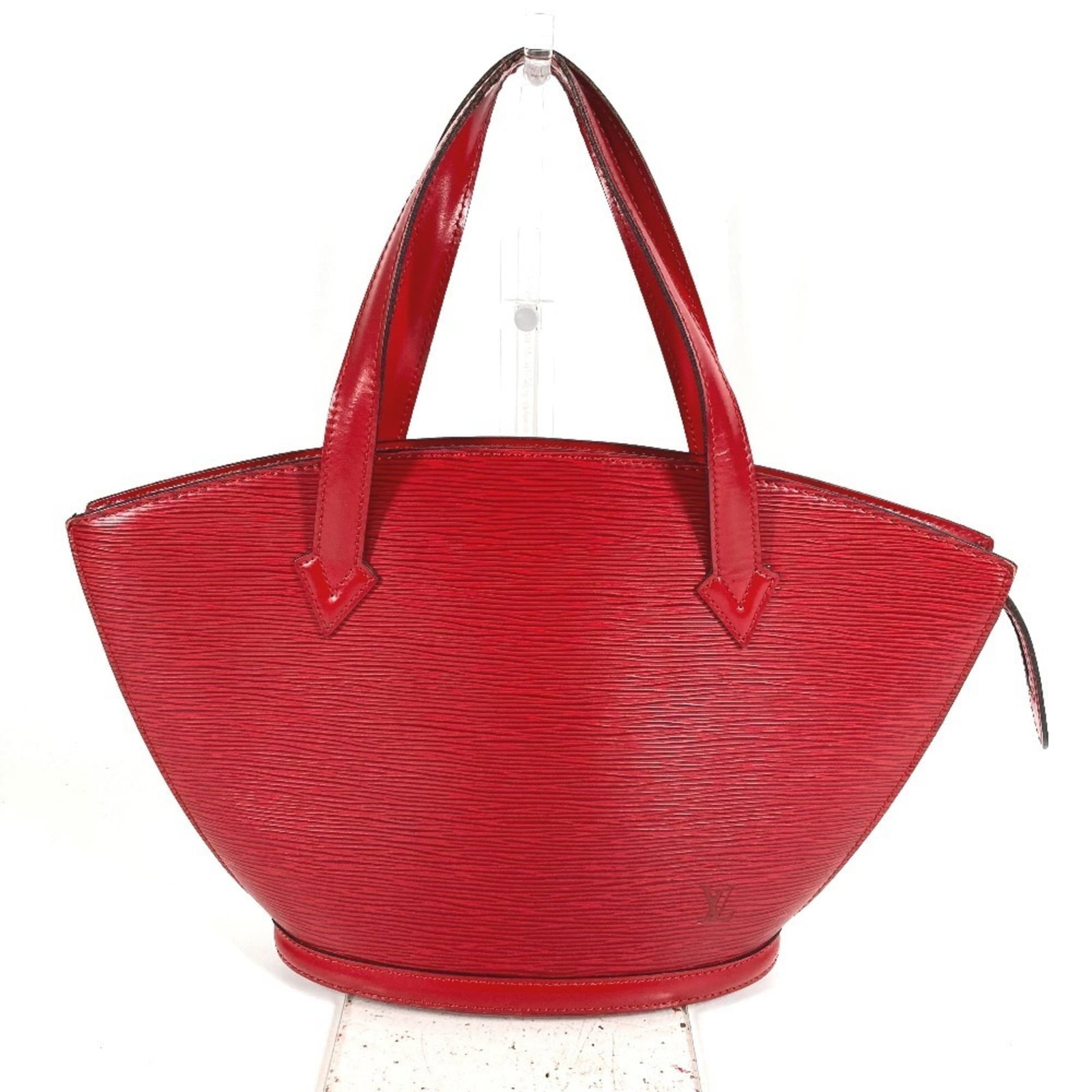 Handbag Leather Epi Tote Bag Shoulder Louis Vuitton: Handbag Leather Epi Tote Bag Shoulder Louis Vuitton Castilian red Epi leather gives this classic Louis Vuitton tote bag its distinctive look and feel. Measuring just 23.5cm x 23cm x 10cm, it's the per