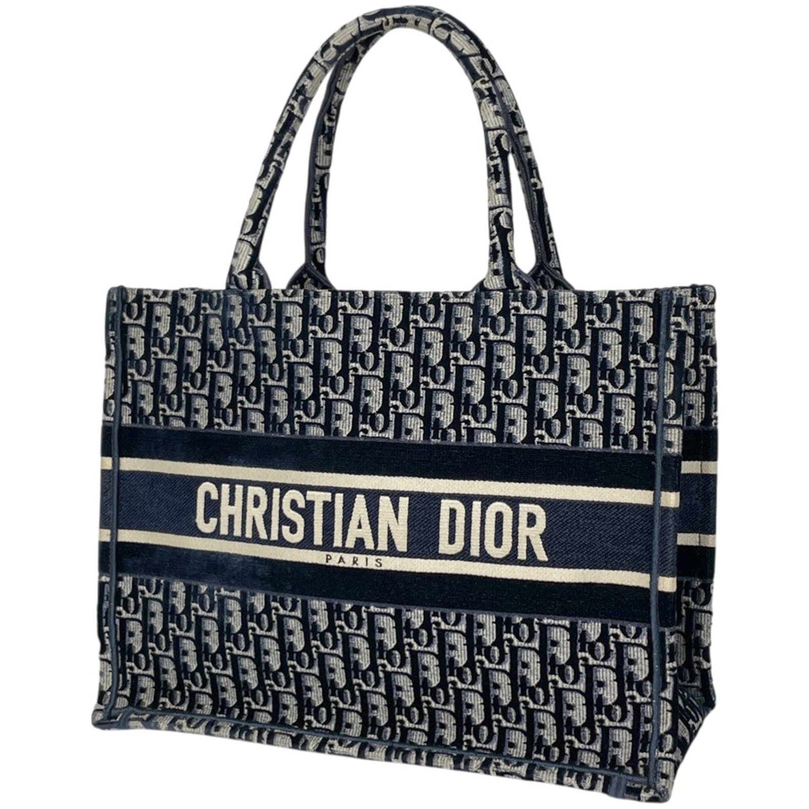 Christian Dior Leather Tote Bag: Christian Dior Leather Tote Bag Christian Dior's iconic leather tote bag boasts a sleek navy velour finish, perfectly balanced by its structured design and classic proportions. Measuring 26cm x 35cm x