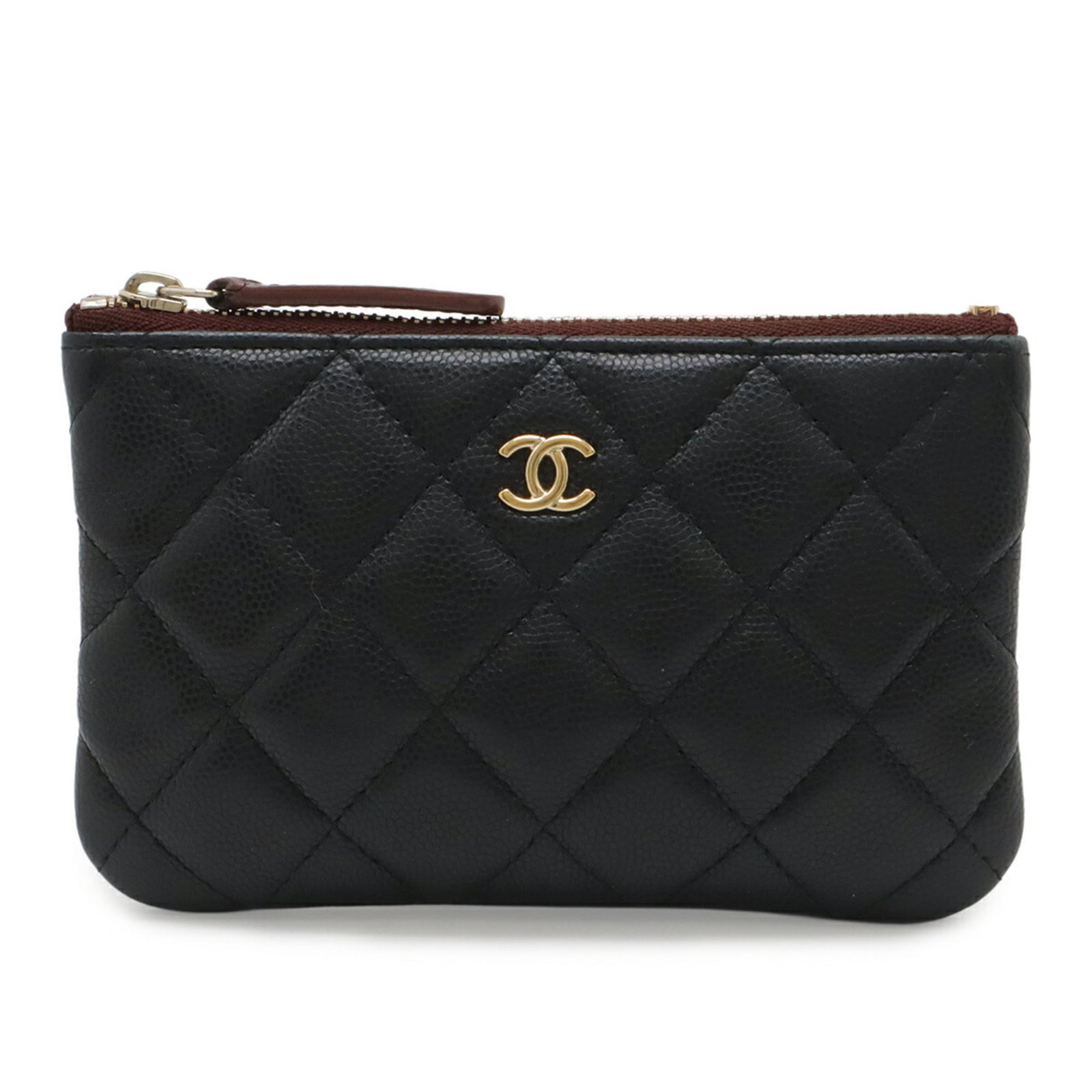 Calfskin pouch by Chanel: Calfskin pouch by Chanel Calfskin pouch by Chanel, crafted from high-quality grained calfskin, features a sleek black design with precise dimensions of 9.5cm x 14.5cm / 3.74'' x 5.7''. This stylish po