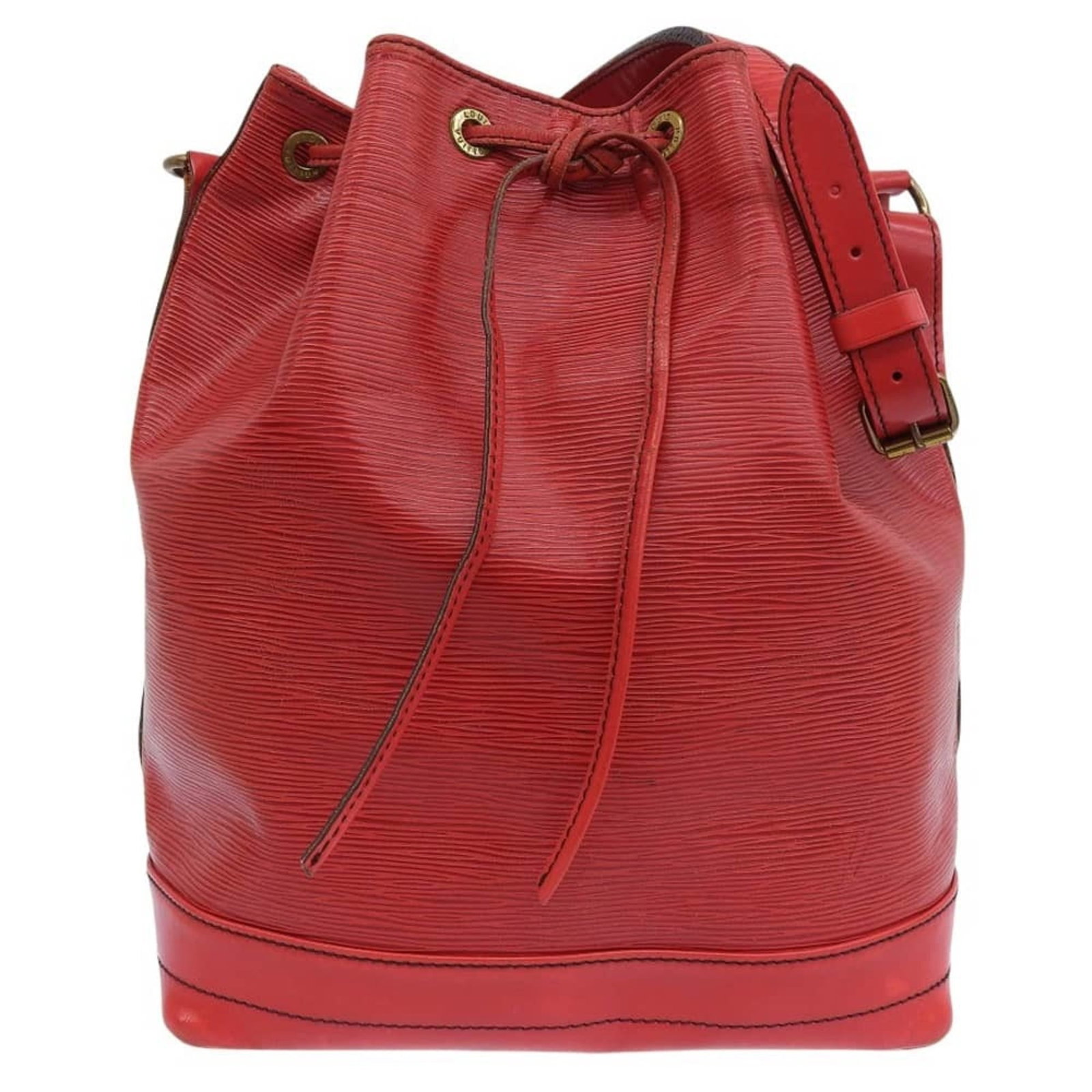 Louis Vuitton Shoulder Bag Leather: Louis Vuitton Shoulder Bag Leather Castilian red leather wraps around the body of this Louis Vuitton Epi shoulder bag, adding a pop of vibrant color to its classic design. The bag's structured shape a