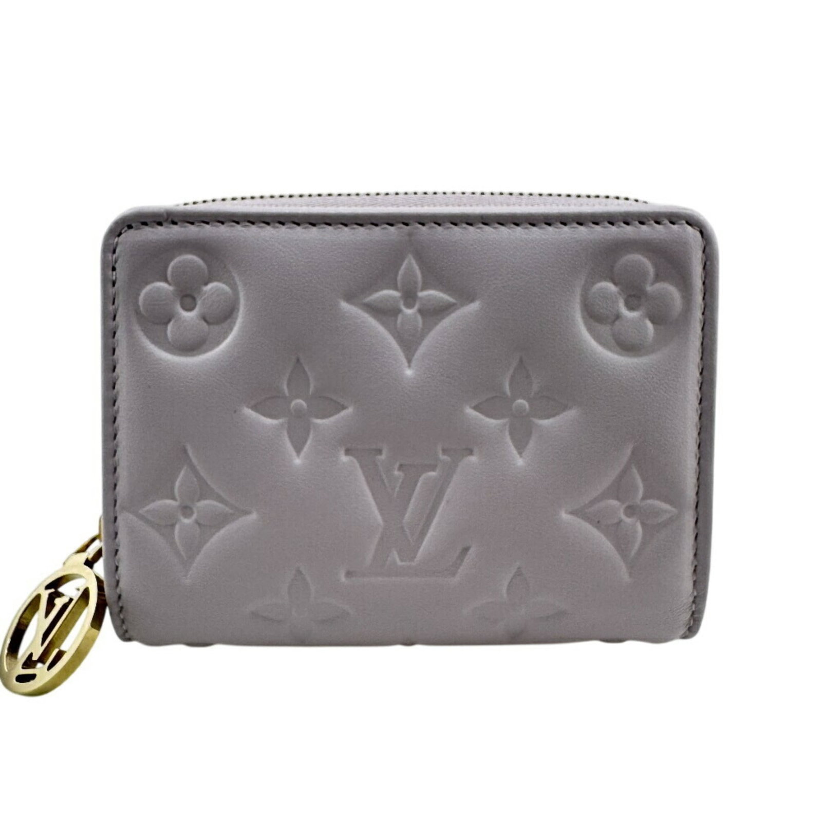 Louis Vuitton Wallet (Bi-Fold) Monogram: Louis Vuitton Wallet (Bi-Fold) Monogram Monogrammed luxury at its finest, this Louis Vuitton bi-fold wallet boasts the iconic monogram pattern in rich purple hues. Crafted from high-quality materials,