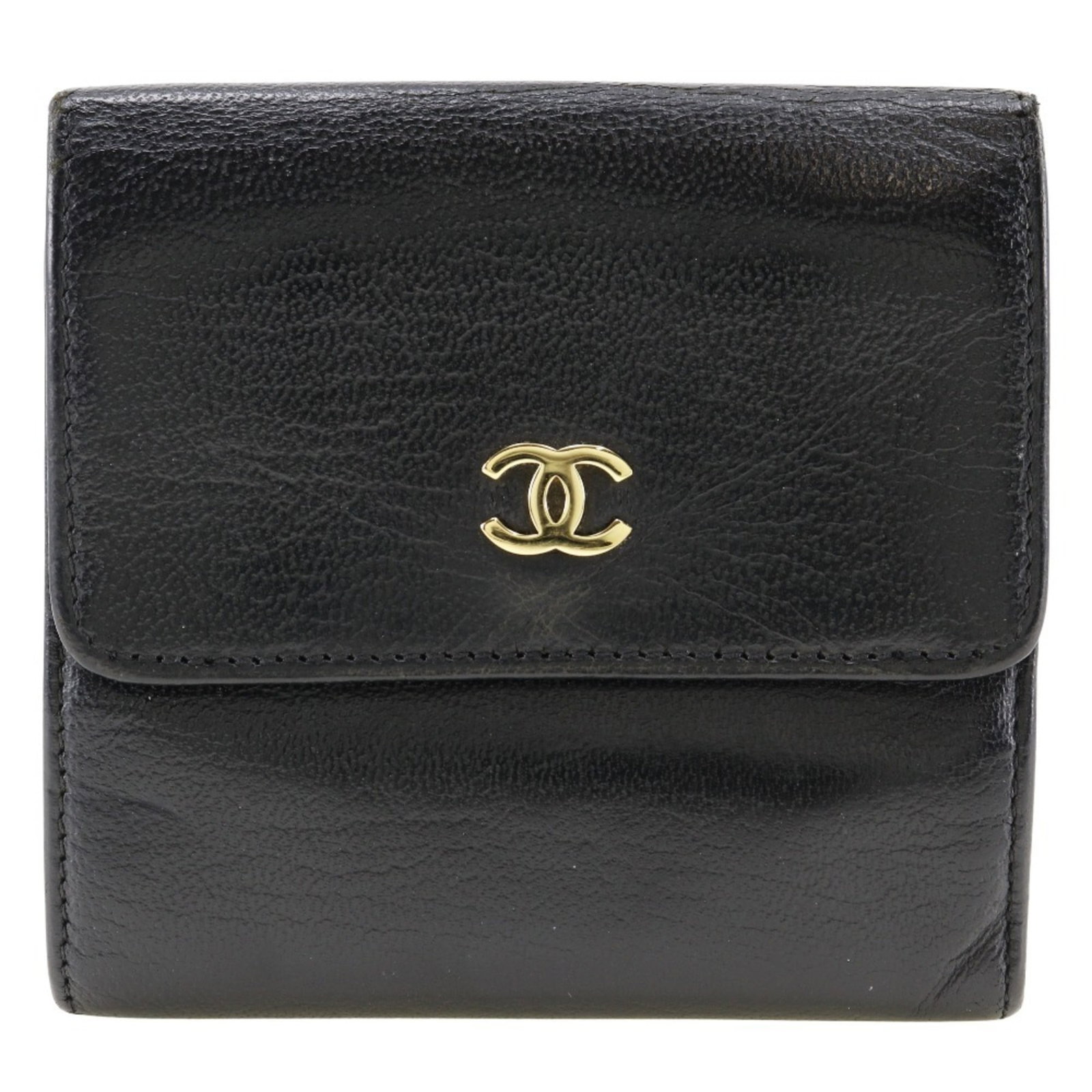 Chanel Wallet Bi Fold Leather: Chanel Wallet Bi Fold Leather The Chanel Wallet Bi Fold Leather is a sleek and sophisticated accessory, crafted from high-quality calfskin leather. Its classic design features a snap fastener closure,