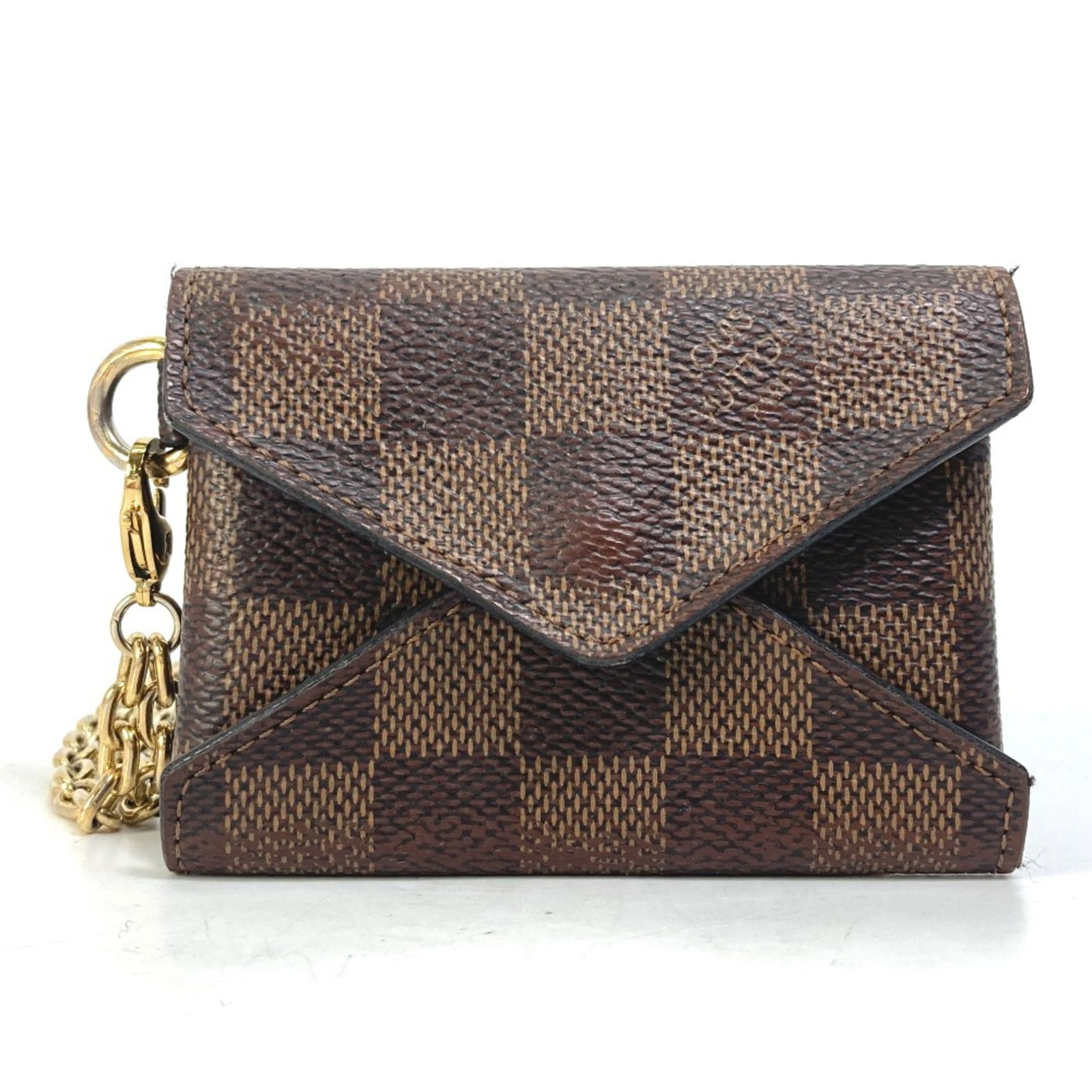 Louis Vuitton purse coin case: Louis Vuitton purse coin case The Louis Vuitton N60285 coin case boasts a rich brown hue and sleek design, measuring 9.5cm x 7cm in width and height. This stylish accessory features the iconic LV mono