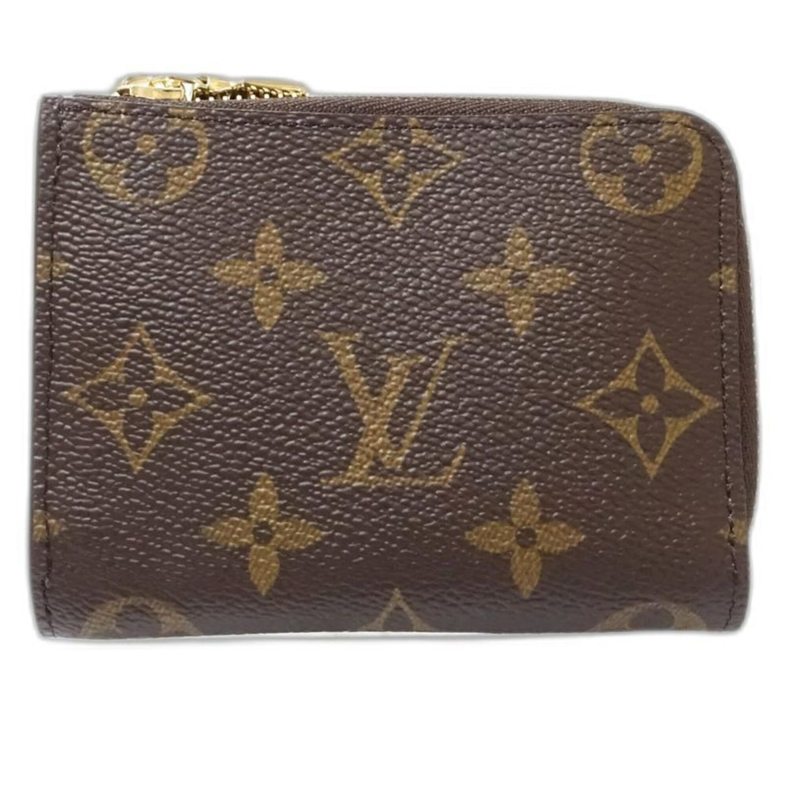 Louis Vuitton Coin Purse/ Coin Case Canvas: Louis Vuitton Coin Purse/ Coin Case Canvas Canvas coin purse from Louis Vuitton, featuring brown color and classic design. Made from high-quality canvas material, this compact purse measures 8.5cm x 1