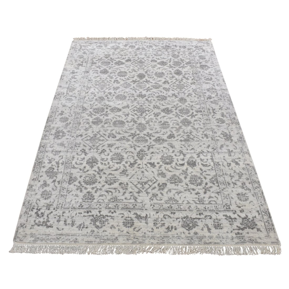 4'1"x6'2" Ivory Erased Tebraz Design Wool and Silk Hand Knotted Rug: 4'1"x6'2" Ivory Erased Tebraz Design Wool and Silk Hand Knotted Rug This stunning ivory-colored hand-knotted rug boasts an intricate broken design in wool and silk, creating a unique and visually stri