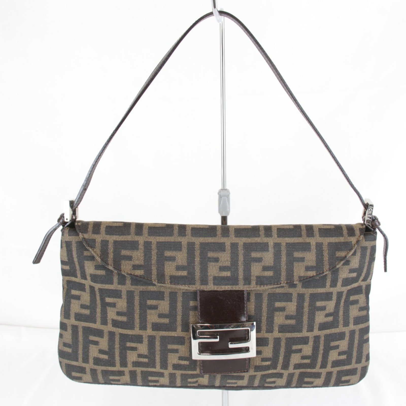 Shoulder Bag Canvas By Fendi: Shoulder Bag Canvas By Fendi Canvas by Fendi shoulder bag with brown and khaki color options, featuring a unique canvas material. Measuring 19cm x 31.5cm x 7cm, it has a distinctive size. This bag is 