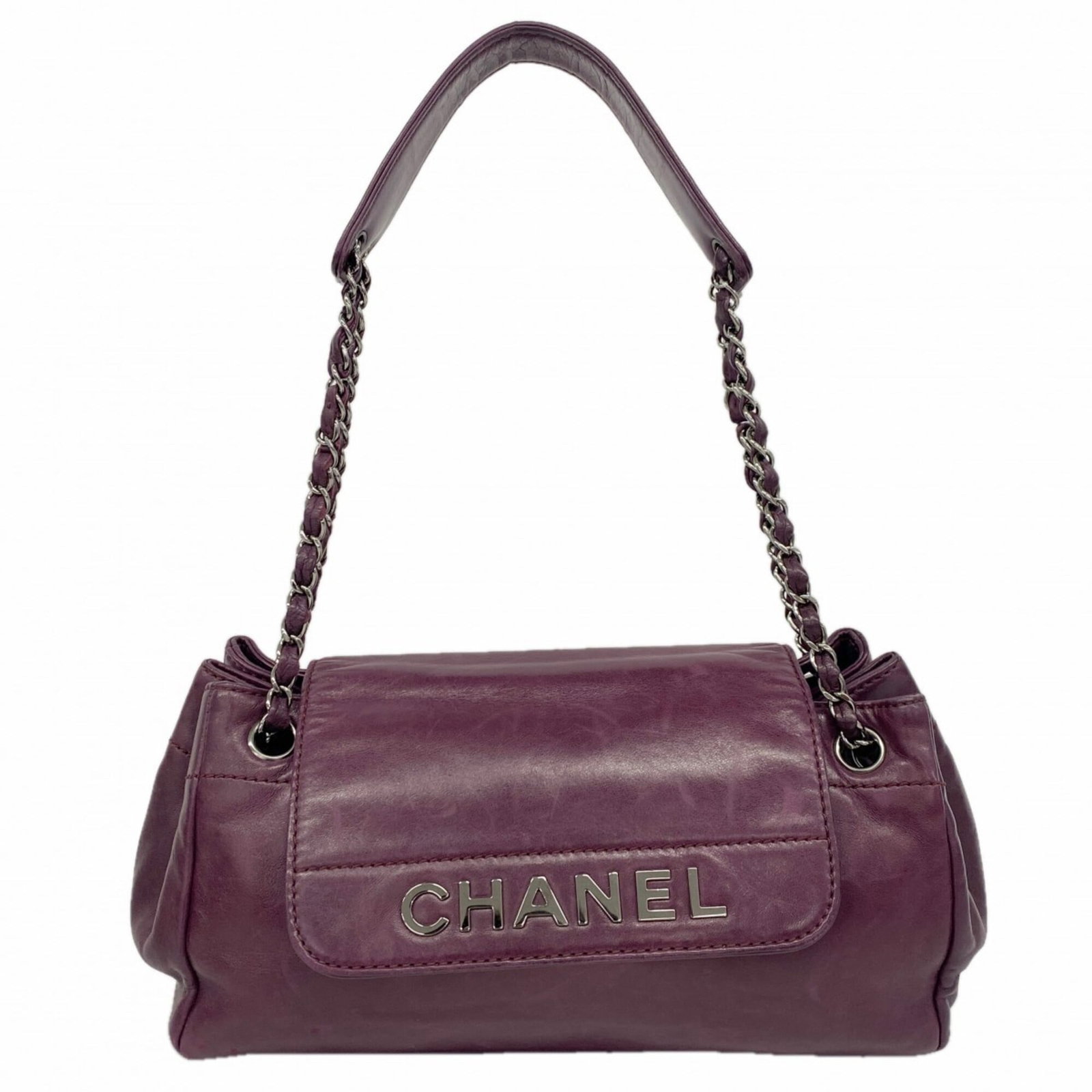 Shoulder Bag Leather Chanel: Shoulder Bag Leather Chanel This luxurious shoulder bag is crafted from rich, purple lambskin leather and features sleek silver hardware. Measuring 19cm x 30.5cm x 13cm, it offers a stylish and