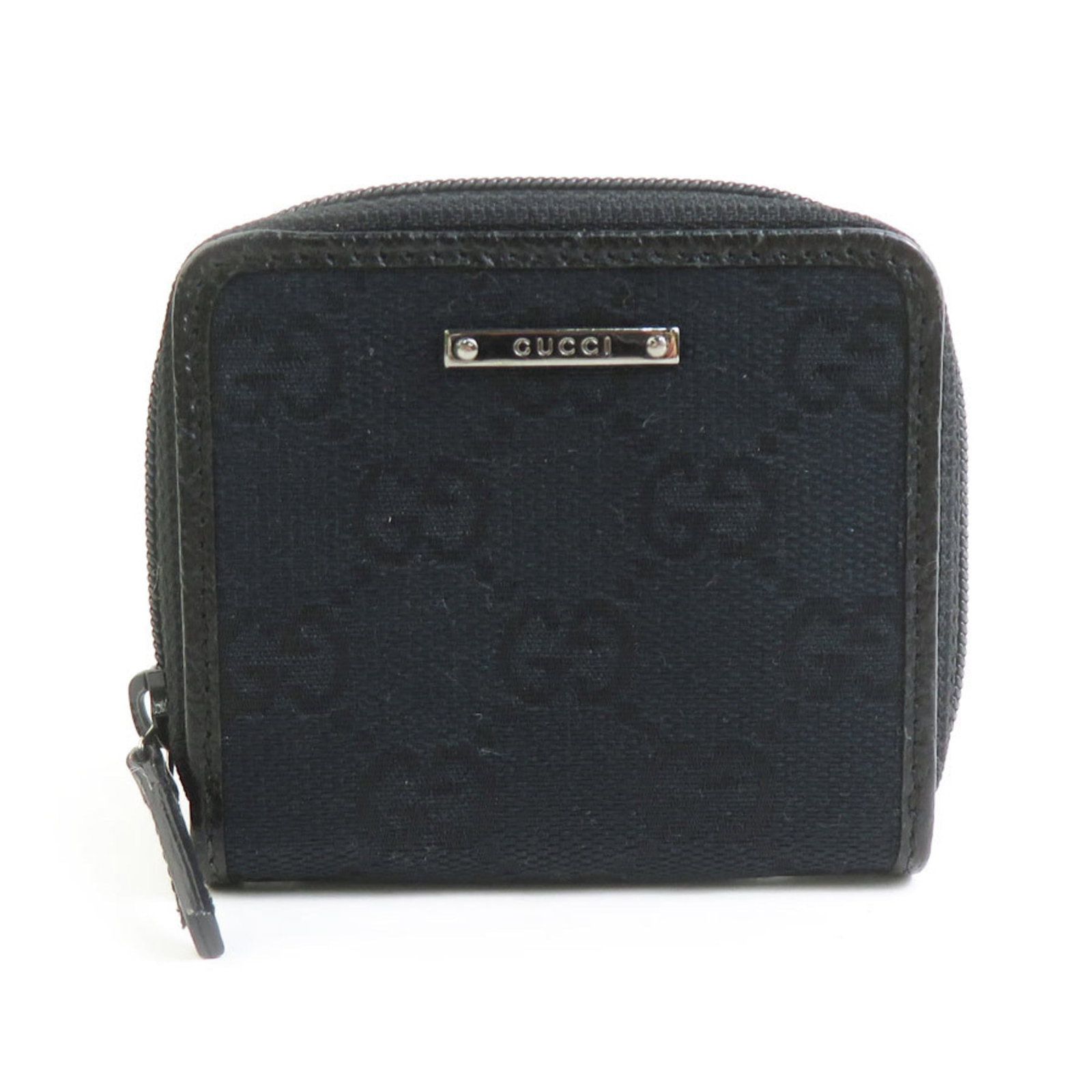 Gucci Coin Purse/ Coin Case Gg Canvas Leather: Gucci Coin Purse/ Coin Case Gg Canvas Leather Gucci Coin Purse/ Coin Case Gg Canvas Leather features the iconic GG canvas and leather design, crafted in Italy. This sleek black coin purse measures 7cm