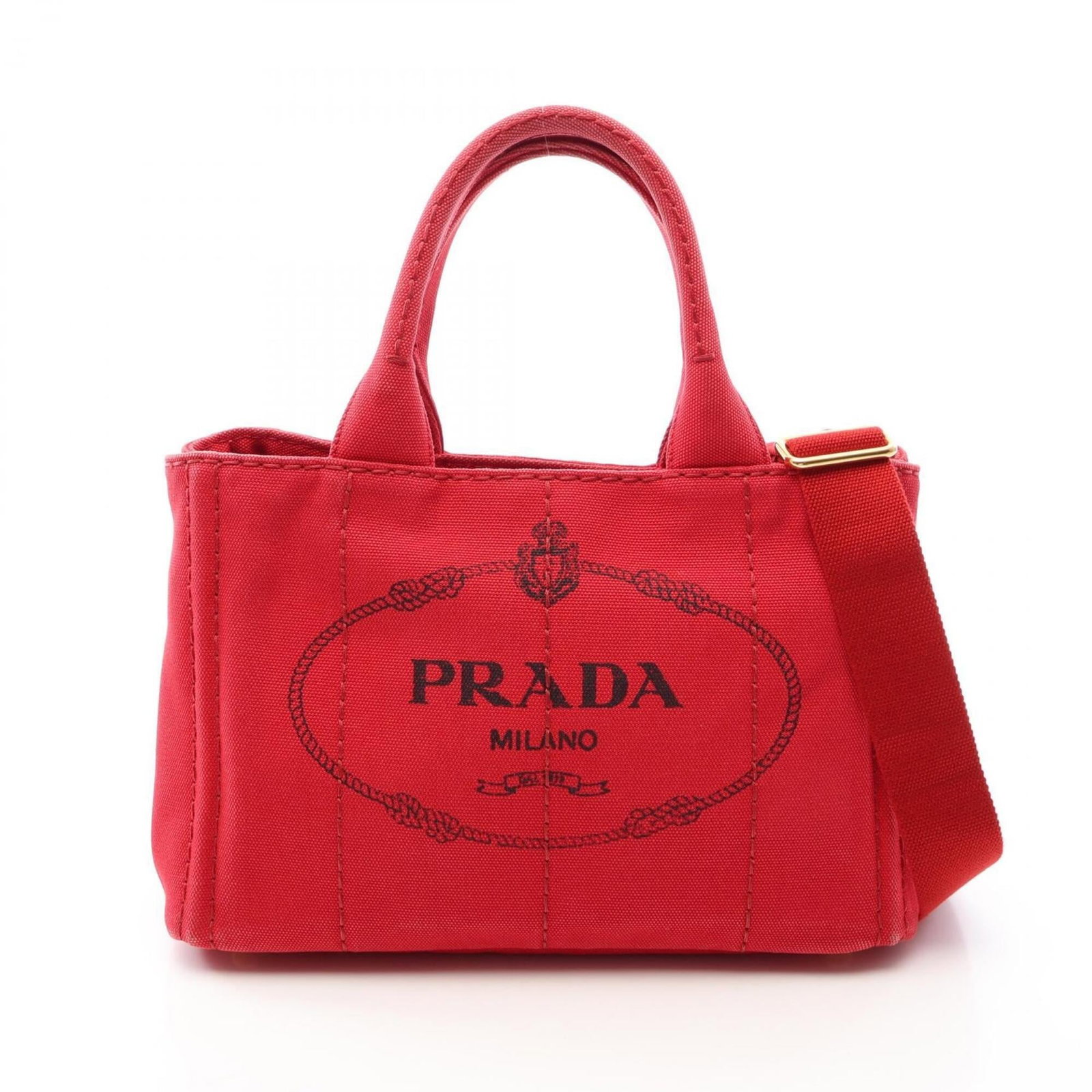 Canvas tote bag handbag Prada: Canvas tote bag handbag Prada Canvas tote bag in red color, made from high-quality canvas material. This stylish and spacious handbag measures 19cm x 28cm x 14cm, perfect for daily use. The Prada bran