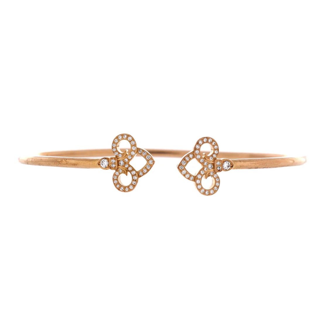 Tiffany & Co. Fleur de Lis Wire Bracelet 18K Rose Gold with Diamonds: Tiffany & Co. Fleur de Lis Wire Bracelet 18K Rose Gold with Diamonds Tiffany & Co.'s Fleur de Lis Wire Bracelet shines in 18K rose gold, adorned with diamonds. This elegant bracelet boasts a classic d