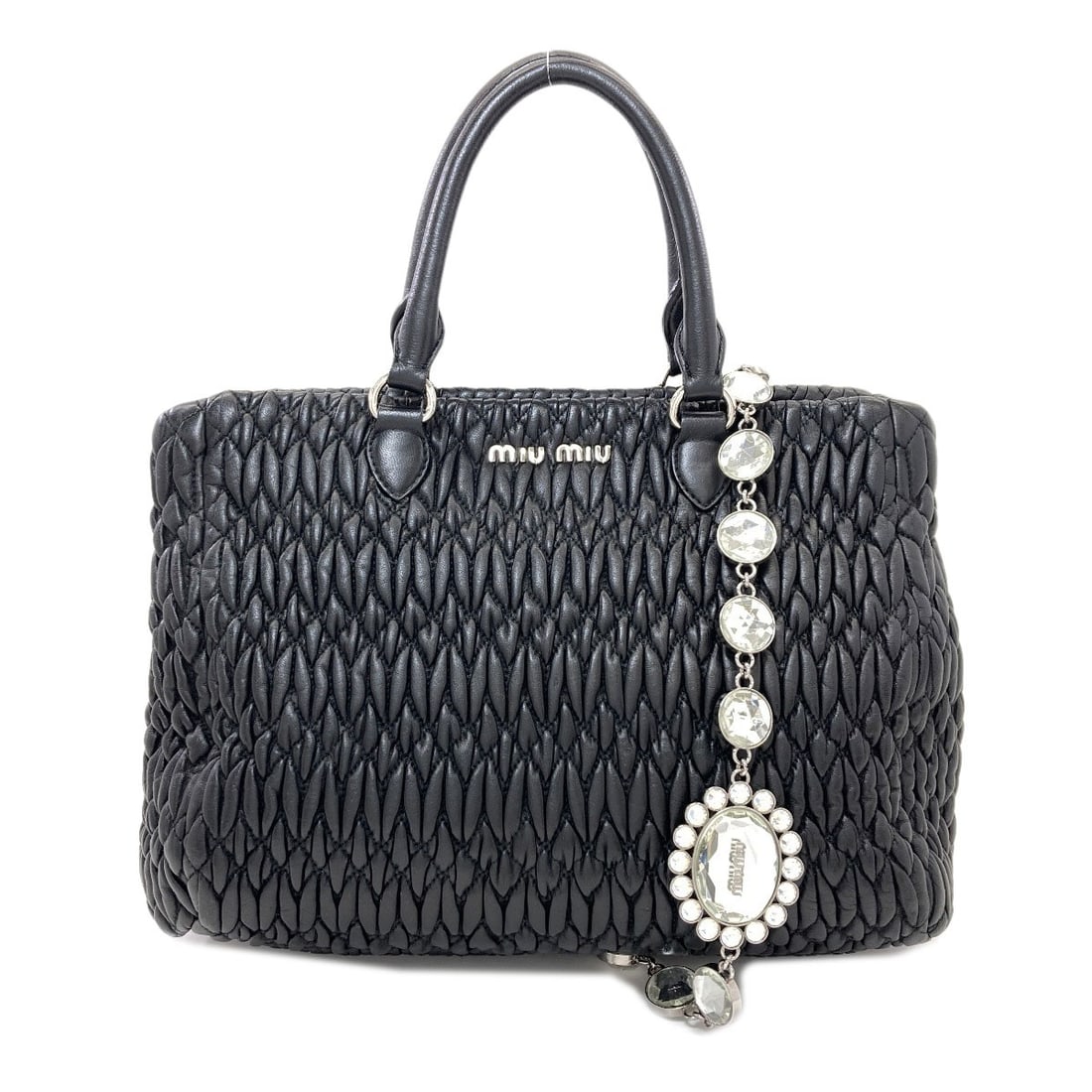 Miumiu Crystal Matelass 2Way Tote Bag Calf: Miumiu Crystal Matelass 2Way Tote Bag Calf Black calf exterior, a sleek and sophisticated choice for the modern tote bag. The MIUMIU Crystal Matelass 2Way Tote Bag boasts a stylish design with its bla