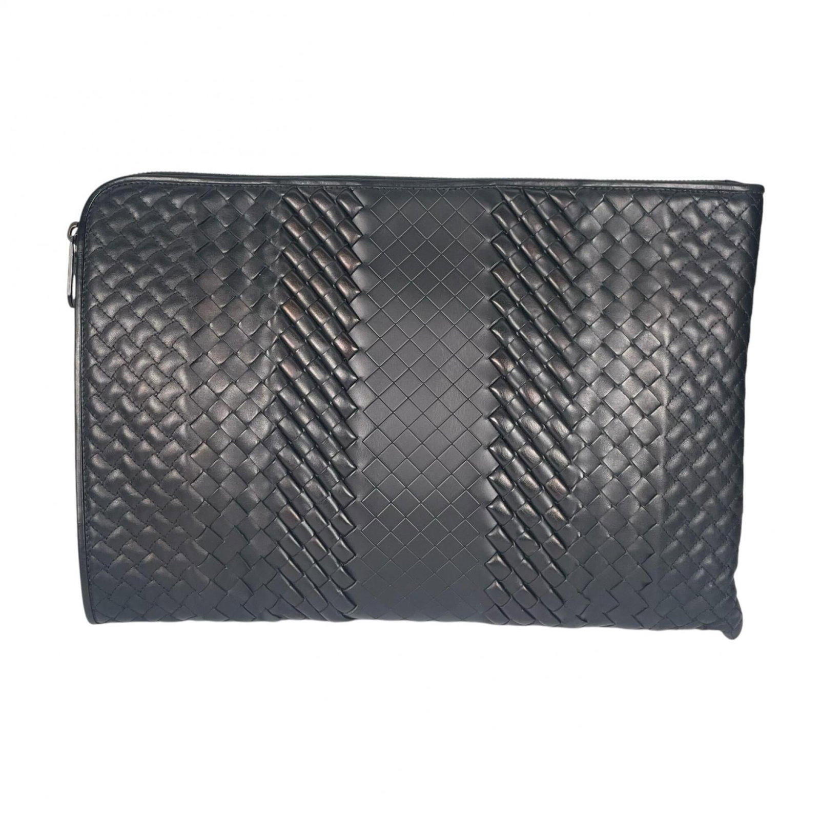 Leather clutch from Bottega Veneta: Leather clutch from Bottega Veneta Bottega Veneta's black leather clutch boasts sleek lines and a versatile design, making it a chic addition to any evening outfit. With its sturdy zipper closure and 