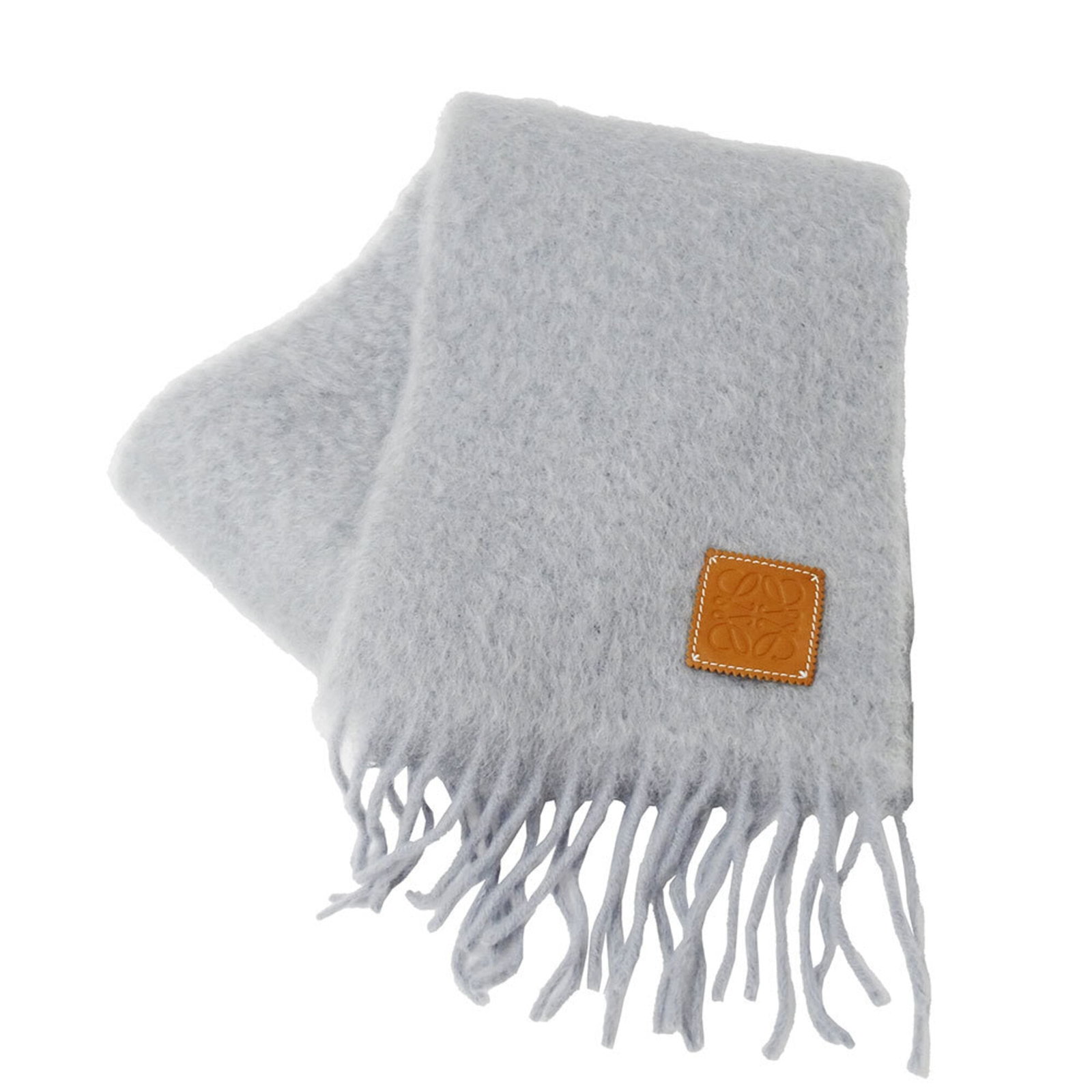 Stole From Wool Mohair: Stole From Wool Mohair Stole from Wool Mohair boasts a sophisticated gray hue, crafted from a blend of wool and mohair materials. Measuring 2.06m x 23cm in length and width, it offers a unique additio