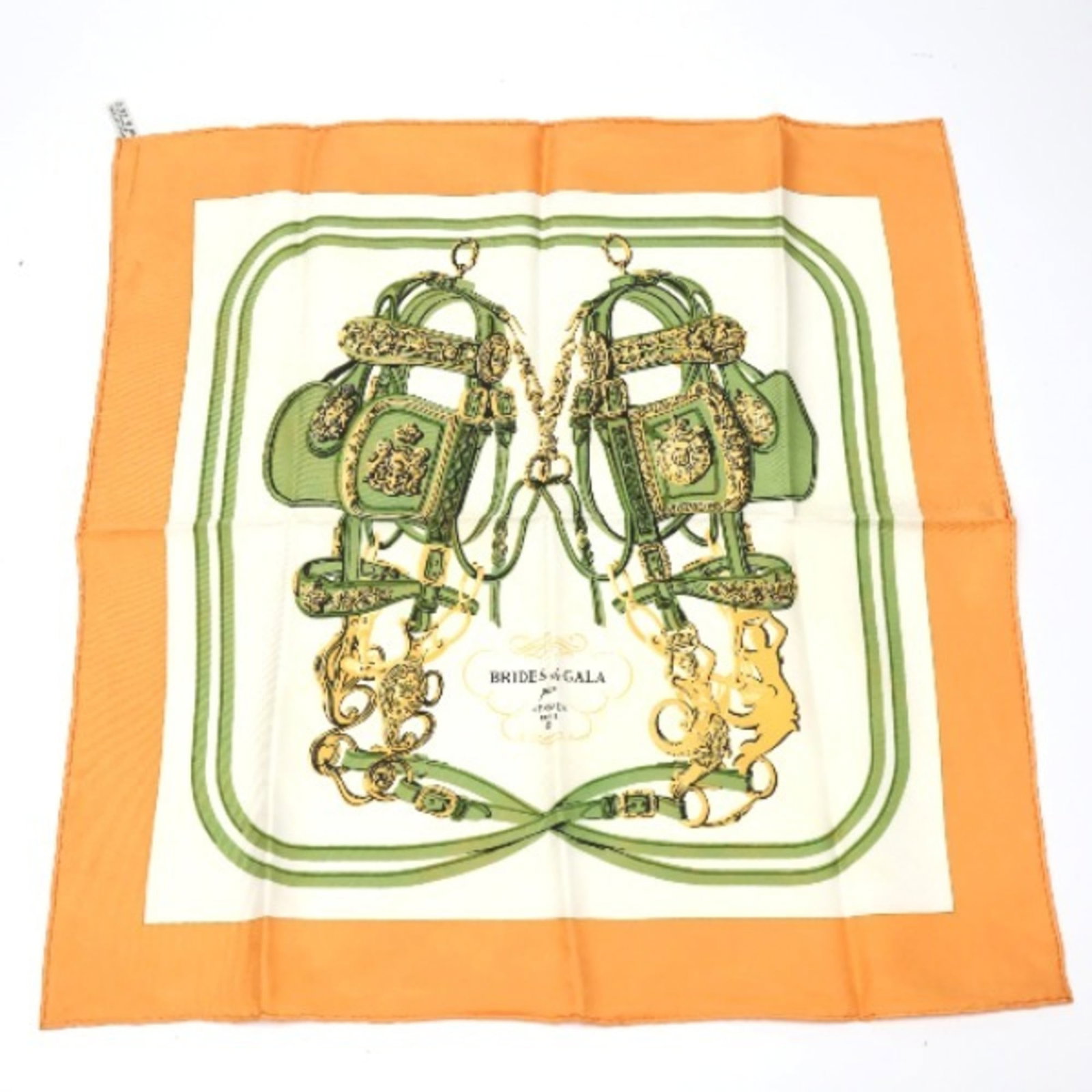 Hermes silk scarf: Hermes silk scarf Silk scarf from renowned luxury brand Hermes, featuring vibrant orange color and elegant silk material. Measuring 41.5cm x 40.5cm, it presents a stylish and compact design. A beautif