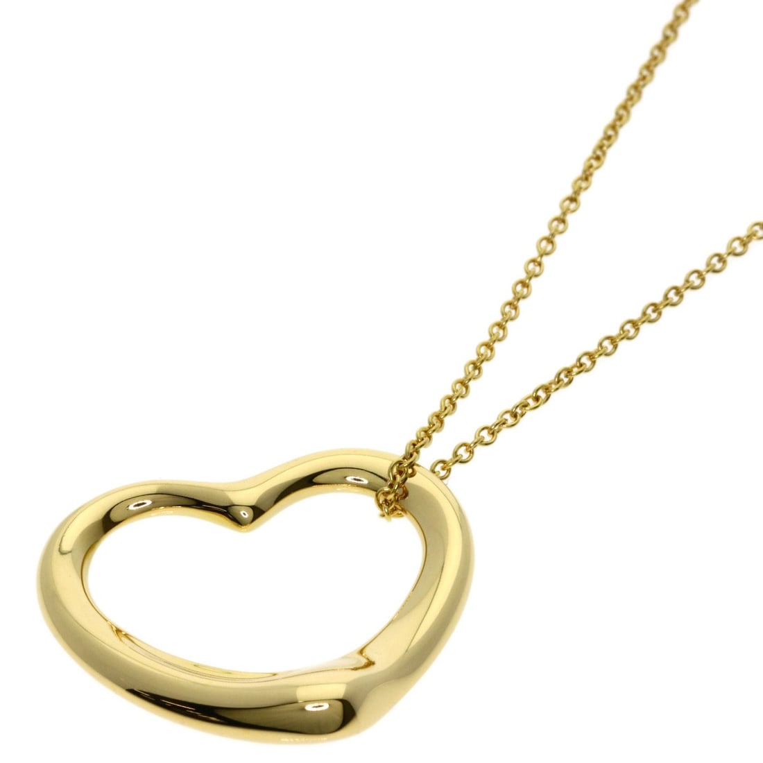 Yellow gold necklace open heart Tiffany Co: Yellow gold necklace open heart Tiffany Co K18 yellow gold necklace with an open heart design from Tiffany & Co. This elegant piece features the iconic brand's signature style and purity, showcasing a