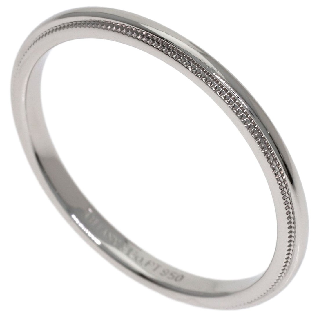 Tiffany and Co Milgrain Ring in Platinum: Tiffany and Co Milgrain Ring in Platinum Platinum Milgrain Ring from Tiffany and Co. features intricate milgrain details, showcasing the brand's signature craftsmanship. This sterling silver-plated ri