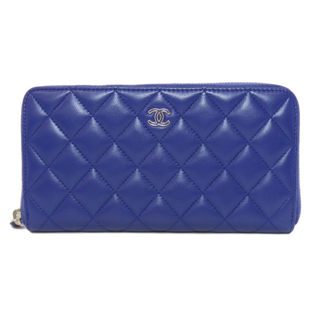 Chanel Matelasse Coco Mark Silverhardware Long Wallet (With Coin Pocket): Chanel Matelasse Coco Mark Silverhardware Long Wallet (With Coin Pocket) Purple lambskin wraps around the sleek design of this long wallet, featuring silver hardware and a coin pocket for added conven