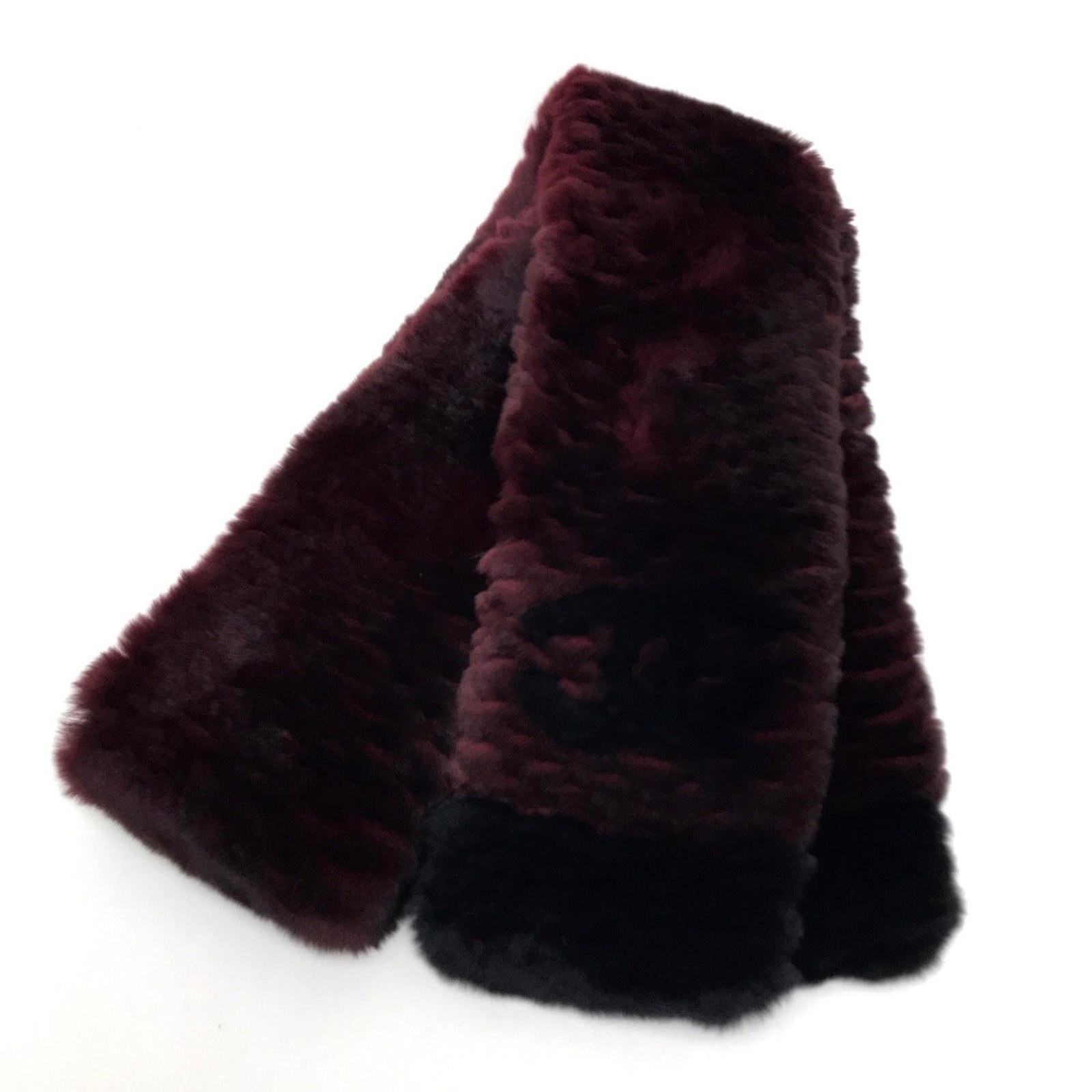 Stole by Chanel: Stole by Chanel Stole by Chanel is a striking red piece, measuring 57.5 inches in height and 13cm in width. Notably, it bears a serial number of 16B, providing a unique identifier for the item. The st