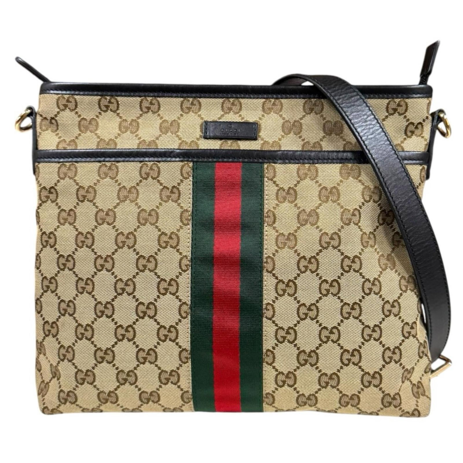 Canvas leather bag gucci shoulder: Canvas leather bag gucci shoulder Canvas leather bag with iconic Gucci design, featuring GG canvas and high-quality leather construction. This black shoulder bag boasts classic style with clean lines 