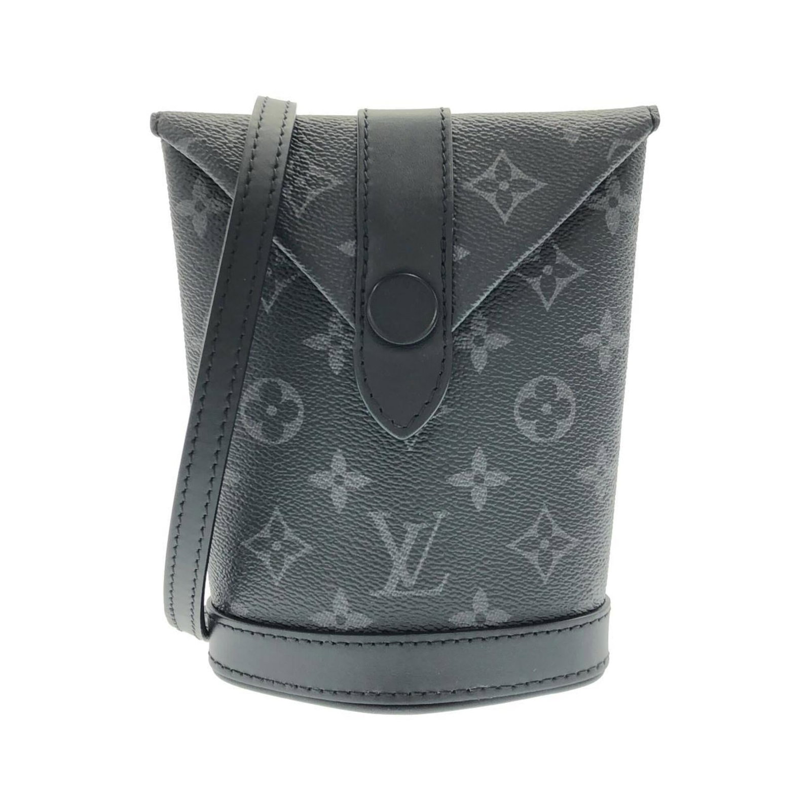 Canvas coated handbag pouch from Louis Vuitton: Canvas coated handbag pouch from Louis Vuitton Canvas coated handbag pouch from Louis Vuitton, featuring black coated canvas material and a signature. This compact accessory measures 17.5cm x 45cm x 7