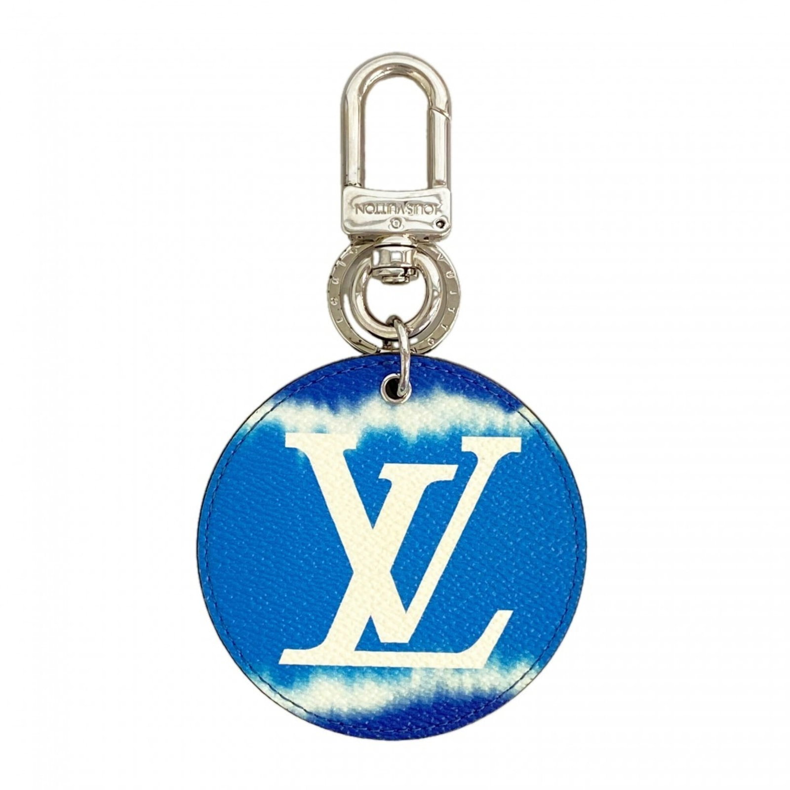 Keyring by Louis Vuitton: Keyring by Louis Vuitton The Louis Vuitton keyring boasts a sleek blue hue, measuring 14cm in height and 8cm in width. Its compact size belies its stylish presence, making it an elegant accessory for 