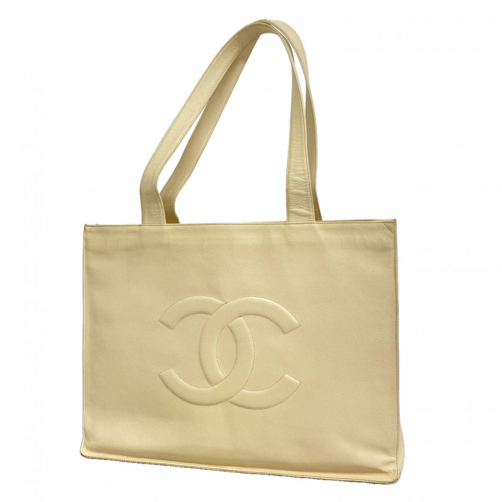 Chanel Tote Bag Grained Calfskin: Chanel Tote Bag Grained Calfskin Grained Calfskin Chanel Tote Bag - A Timeless Classic. Made from high-quality Grained Calfskin, this iconic tote bag features a sleek white finish and gold hardware. W