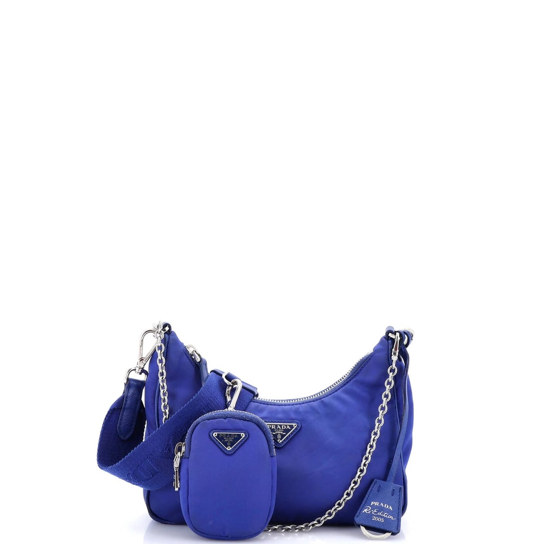 Re edition small tessuto shoulder bag prada 2005: Re edition small tessuto shoulder bag prada 2005 Small Re-Edition Prada Tessuto Shoulder Bag, 2005. This blue nylon cross body bag features a signature style with minor fraying and creases on the exte